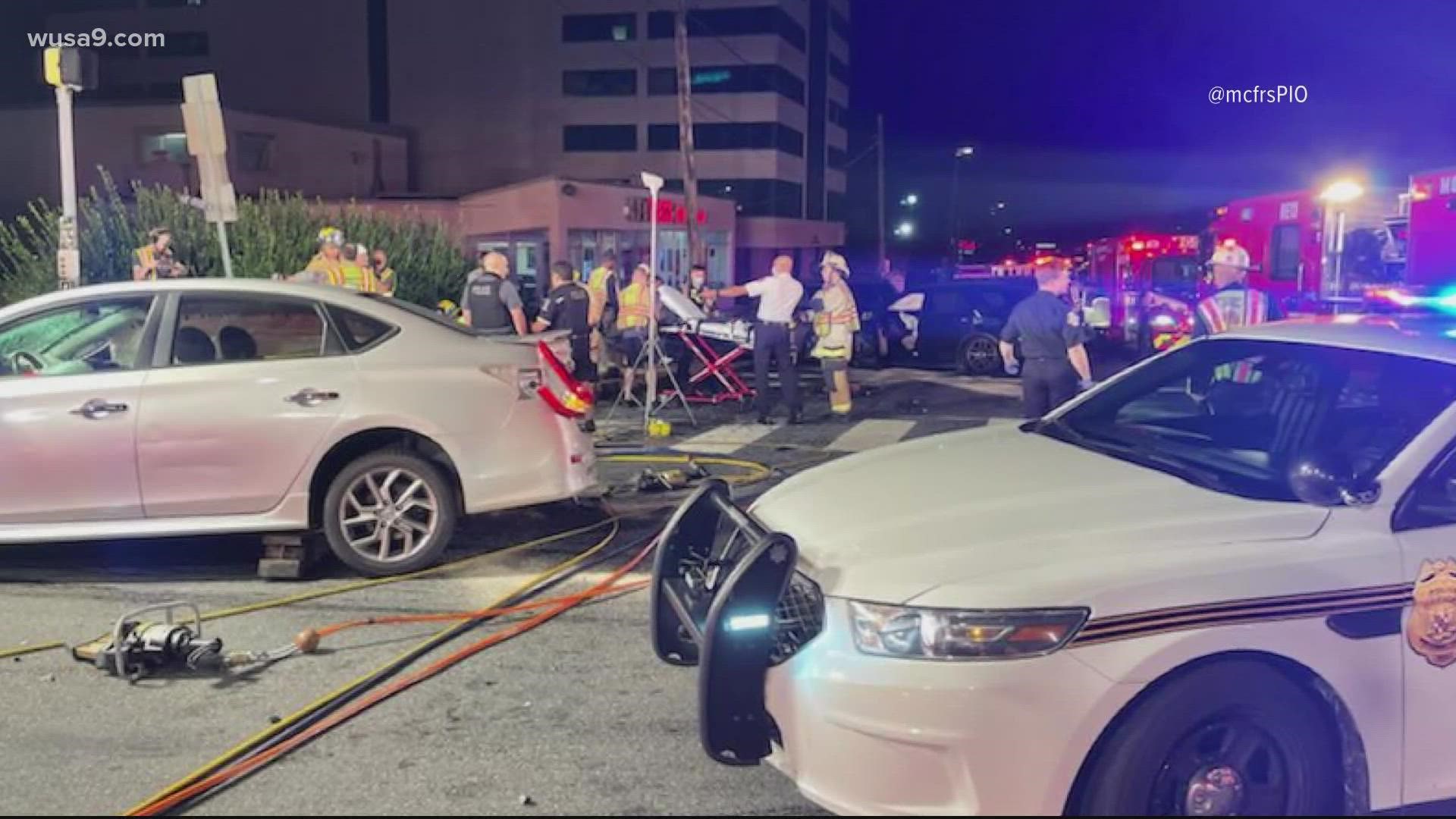The crash involved five cars and resulted in one person being ejected from a vehicle and another was trapped, officials say.