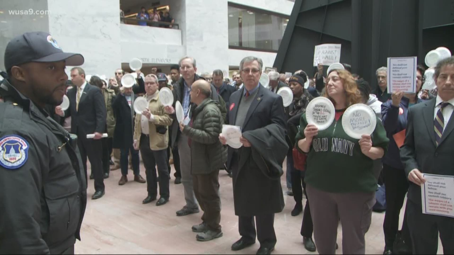 Hundreds of furloughed federal workers and contractors "occupied" the Hart Senate Office Building Wednesday. They stood in silence for 33 minutes -- a minute for each day the government has been shutdown.