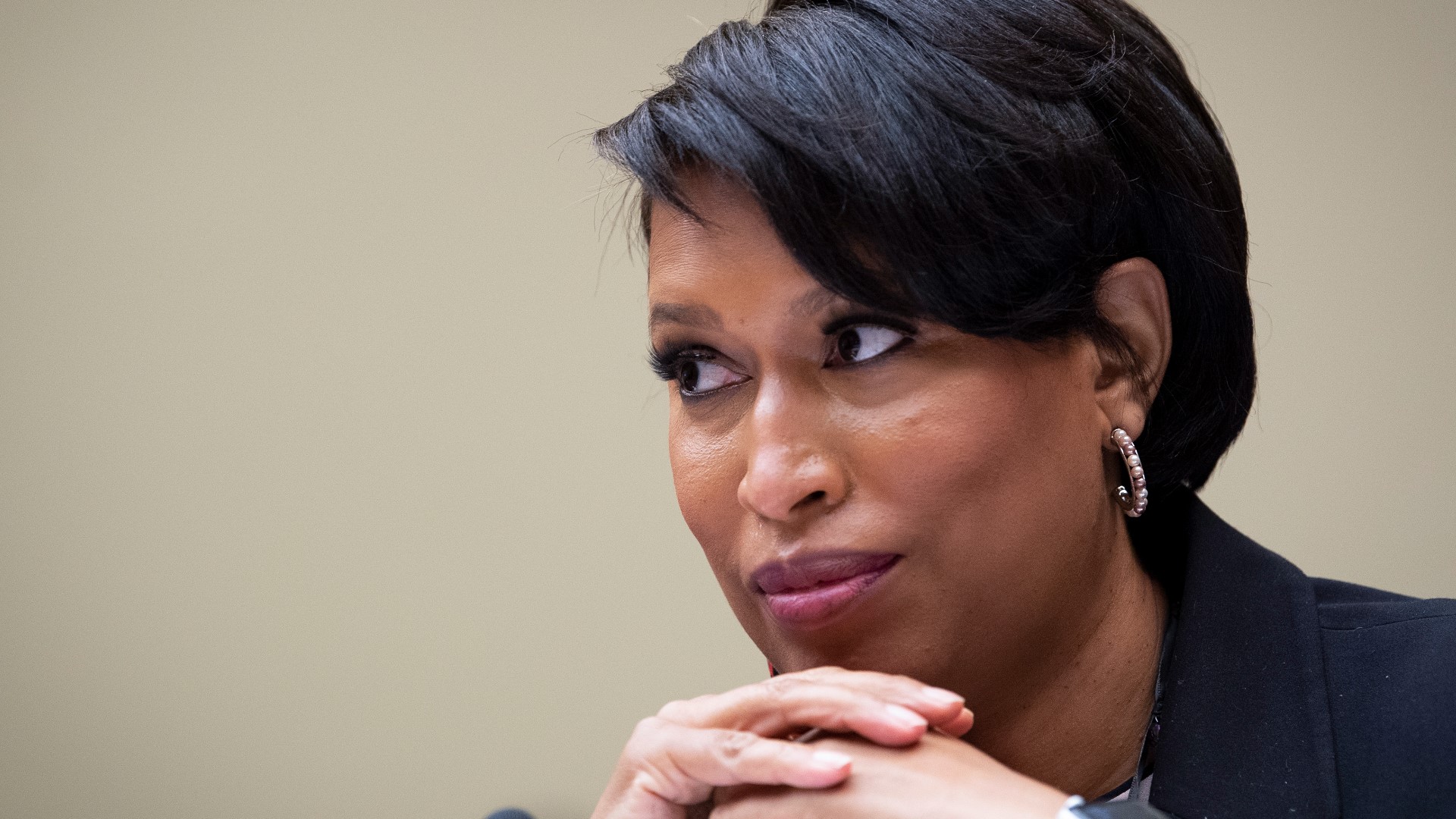 DC Mayor Muriel Bowser's office responded to a controversy involving the mayor photographed without a mask at a wedding reception hours after implementing a mandate.