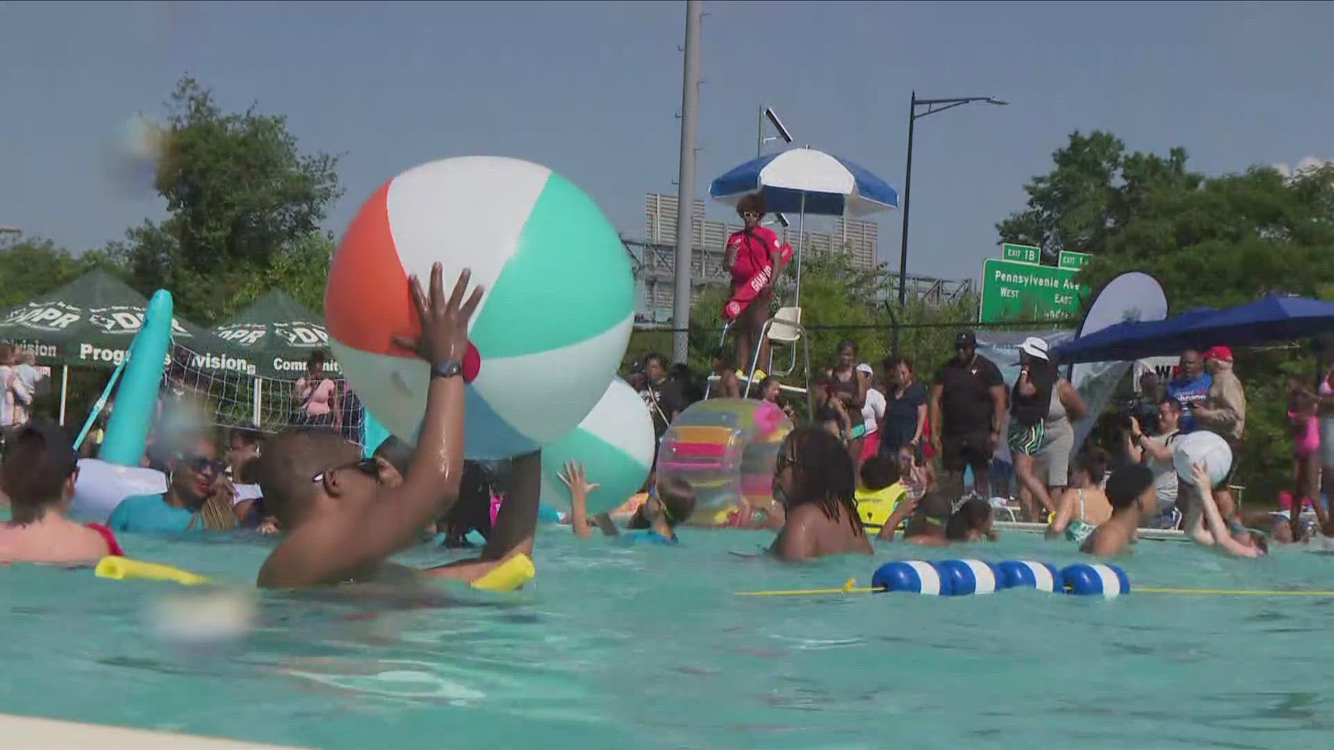 DC MAYOR MURIEL BOWSER OFFICIALLY OPENED THE CITY POOLS BY JUMPING INTO THE ANACOSTIA POOL.