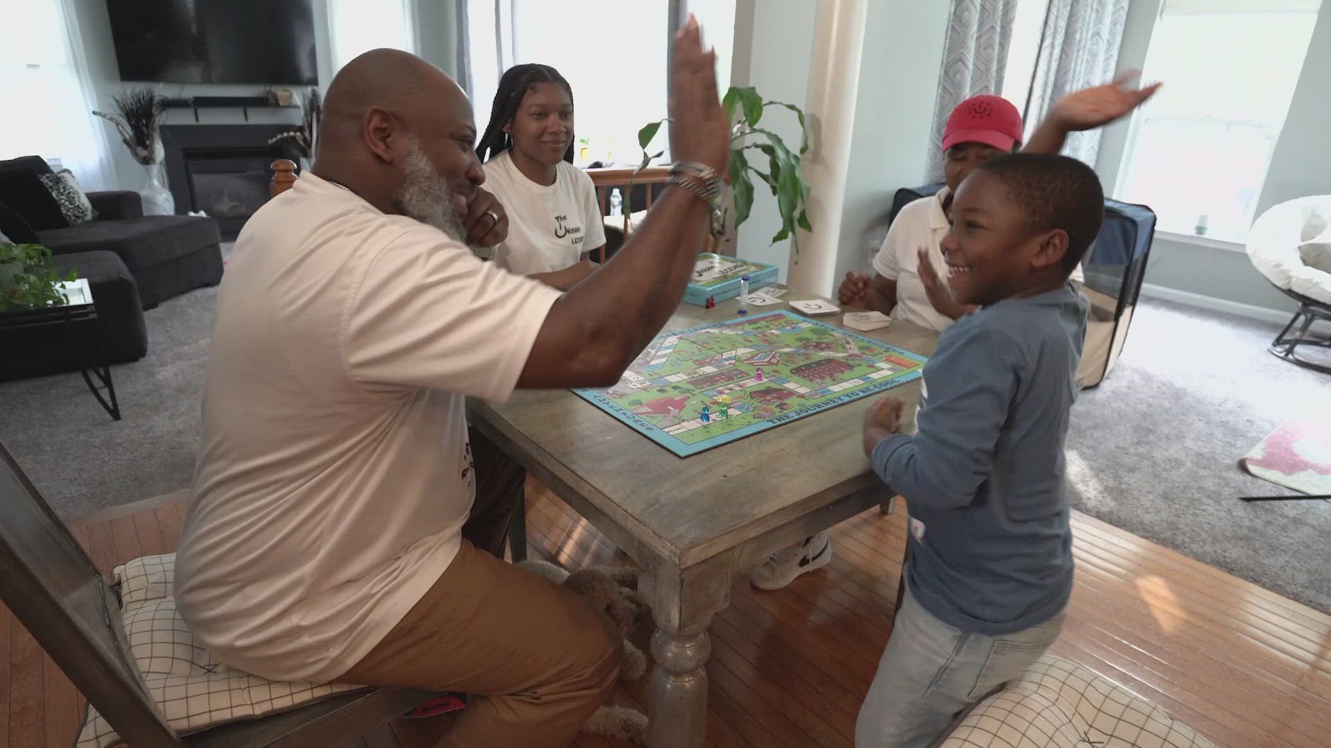 Paris White is a local dad who did the latter. When he played board games with his kids, he didn't see any that reflected his family and his culture of growing up in