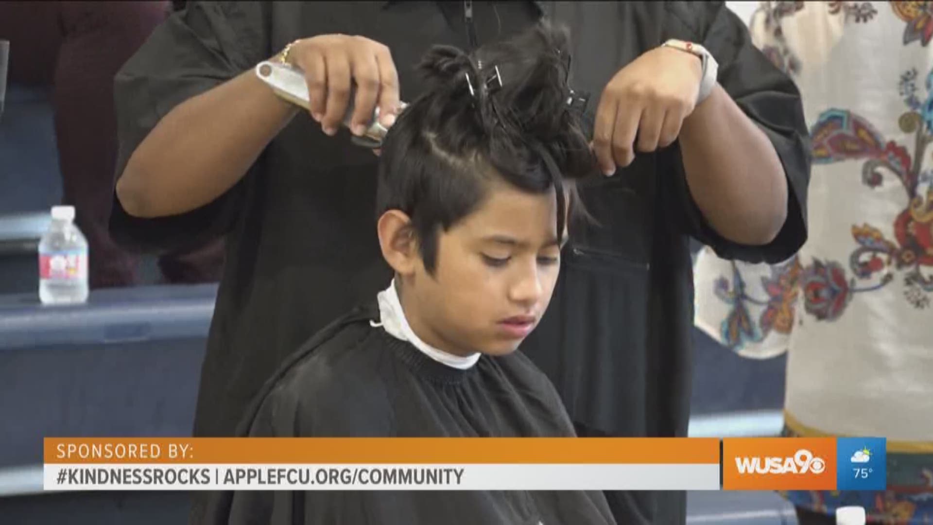 The following segment is sponsored by Apple Federal Credit Union. Apple Federal Credit Union recognized stylists who volunteered their services by giving local kids free back-to-school haircuts. Robert Sowell of Apple Federal Credit Union presented the stylists with gift cards to dinner and free movie tickets to say thank you for spreading kindness in the community. For more information on how Apple Federal Credit Union is promoting kindness in the community go to www.AppleFCU.org/community.