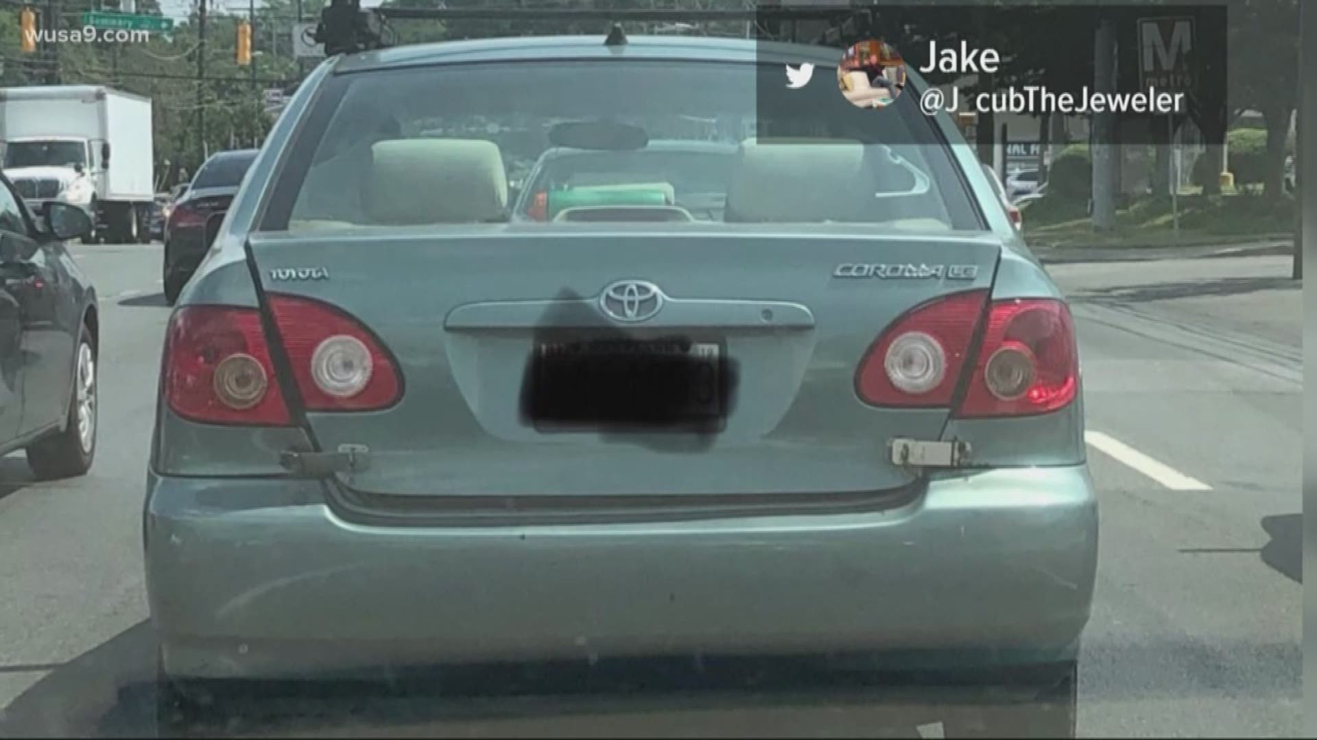 Two metal locks are keeping this trunk closed. It makes us wonder what they have in the trunk. Even if it is just groceries, it seems a lot more suspicious.