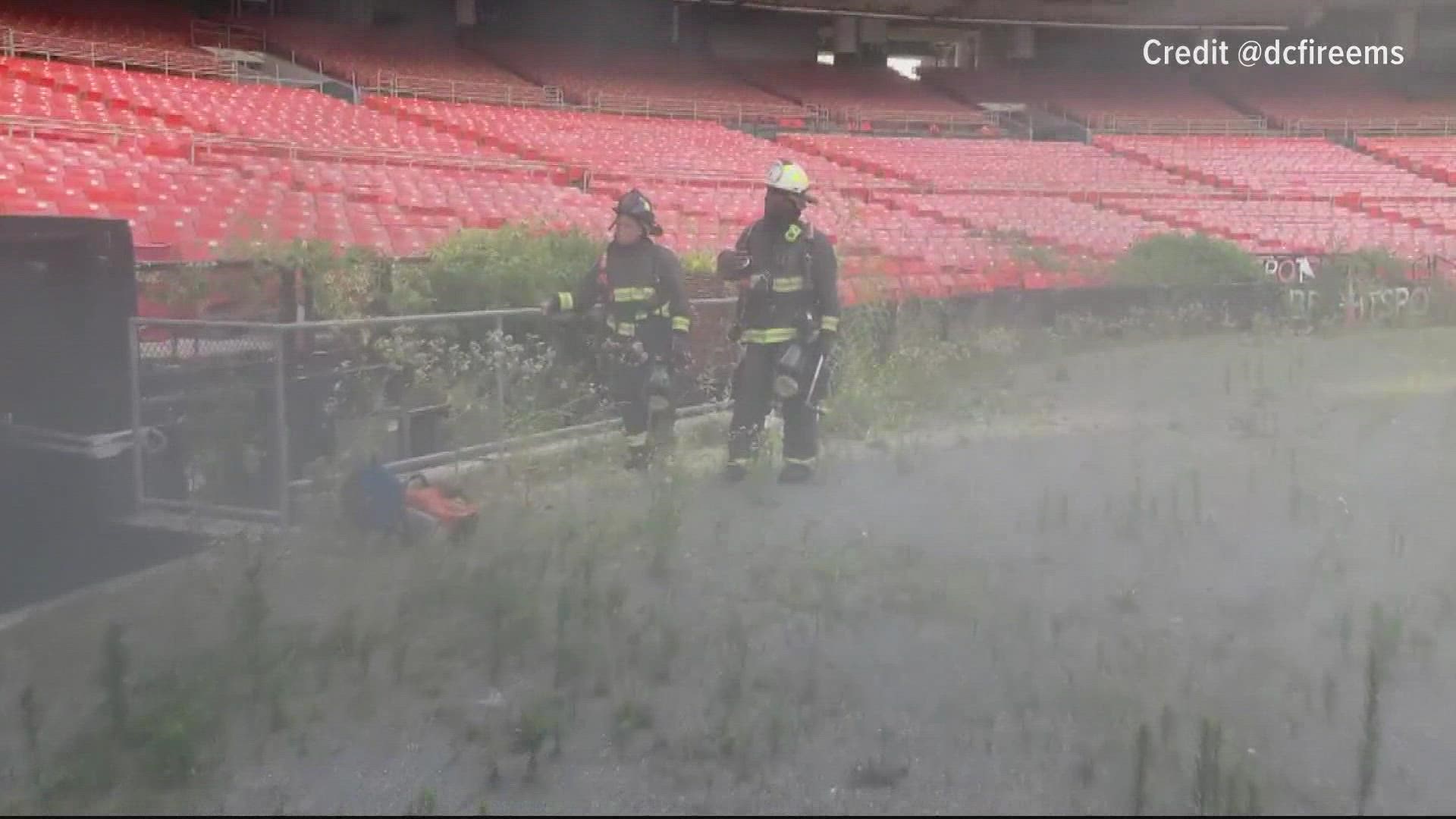 Officials say that DC Fire and EMS are responding to a fire at RFK Stadium in D.C.