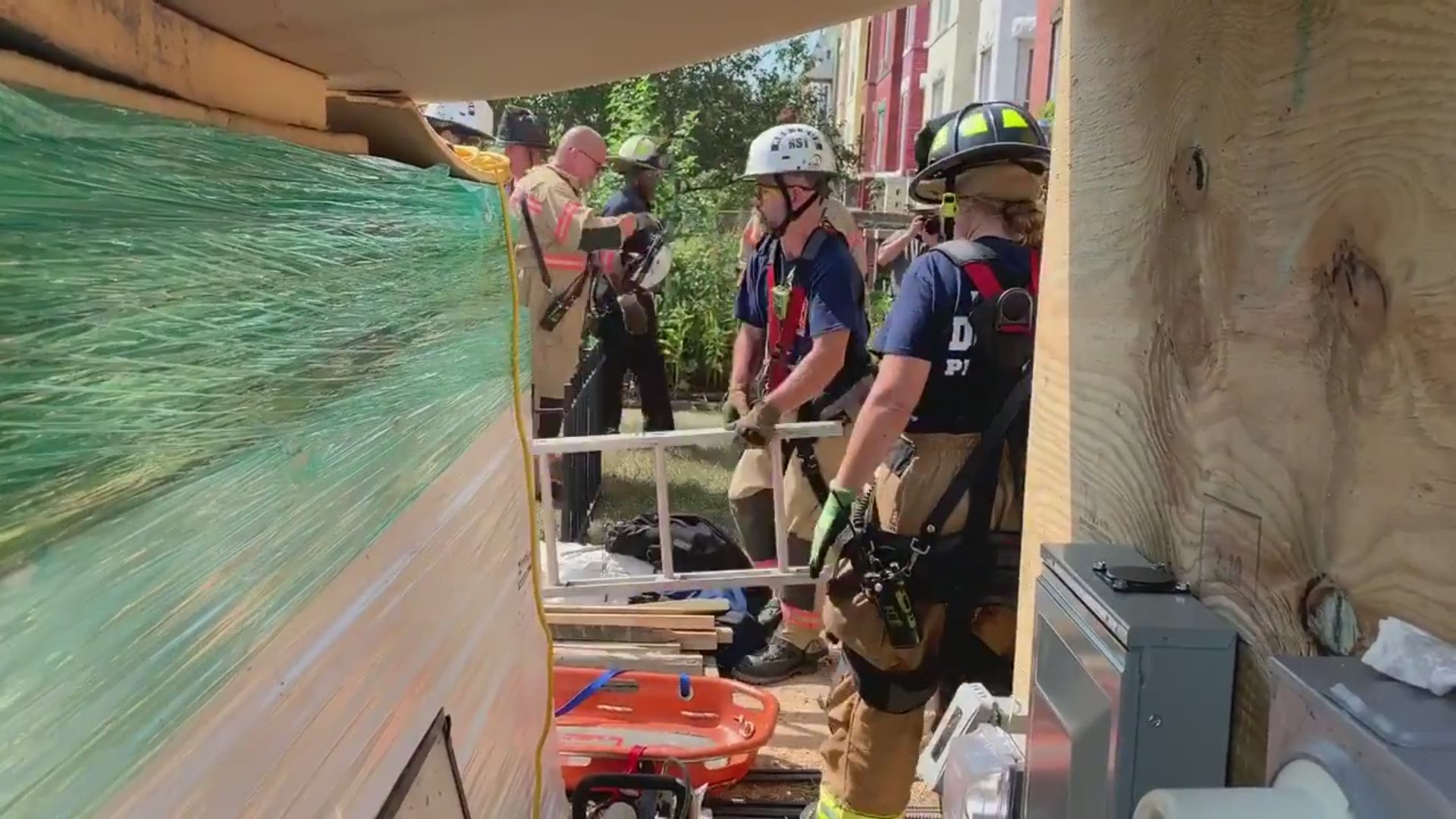 D.C. Fire and EMS rescued a man whose leg was trapped inside a trench in Northwest on Tuesday. The man was pulled out with non-life threatening injuries.