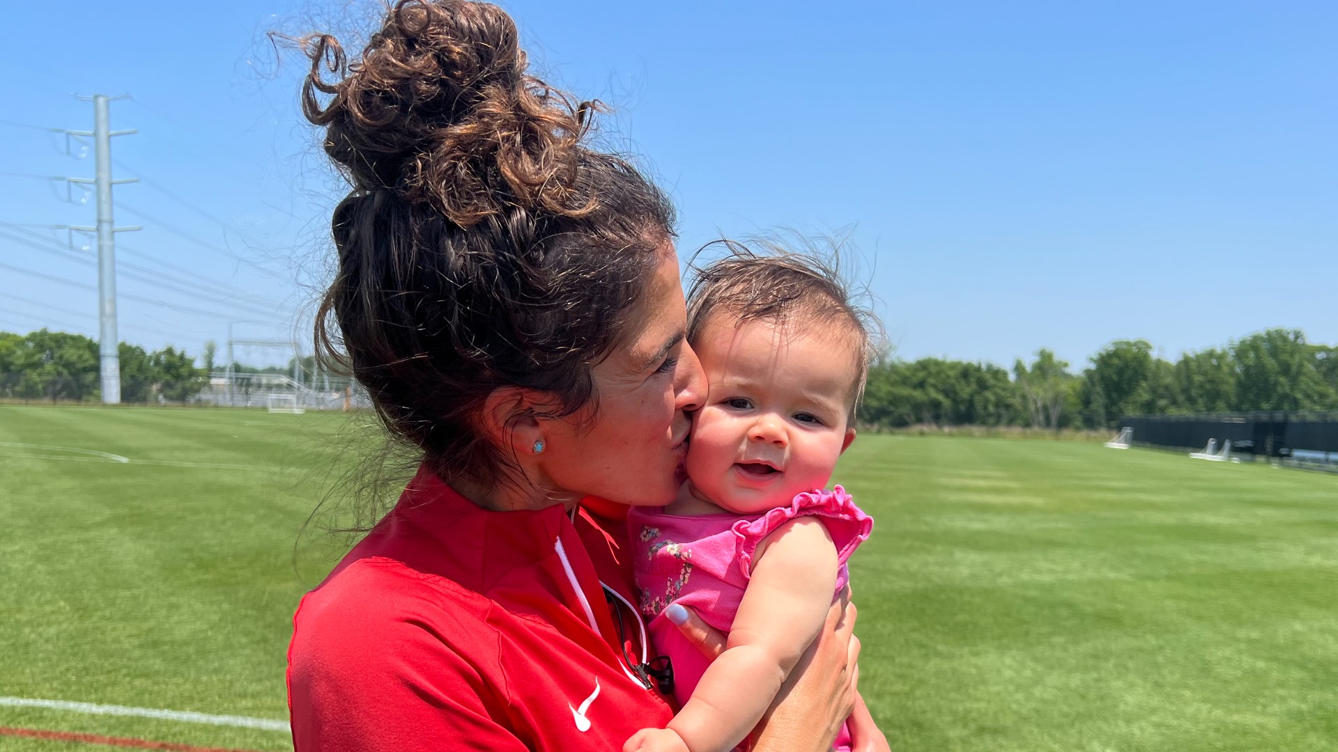 Spirit assistant coach, Angela Salem inspiring her players as she brings motherhood to the pitch.