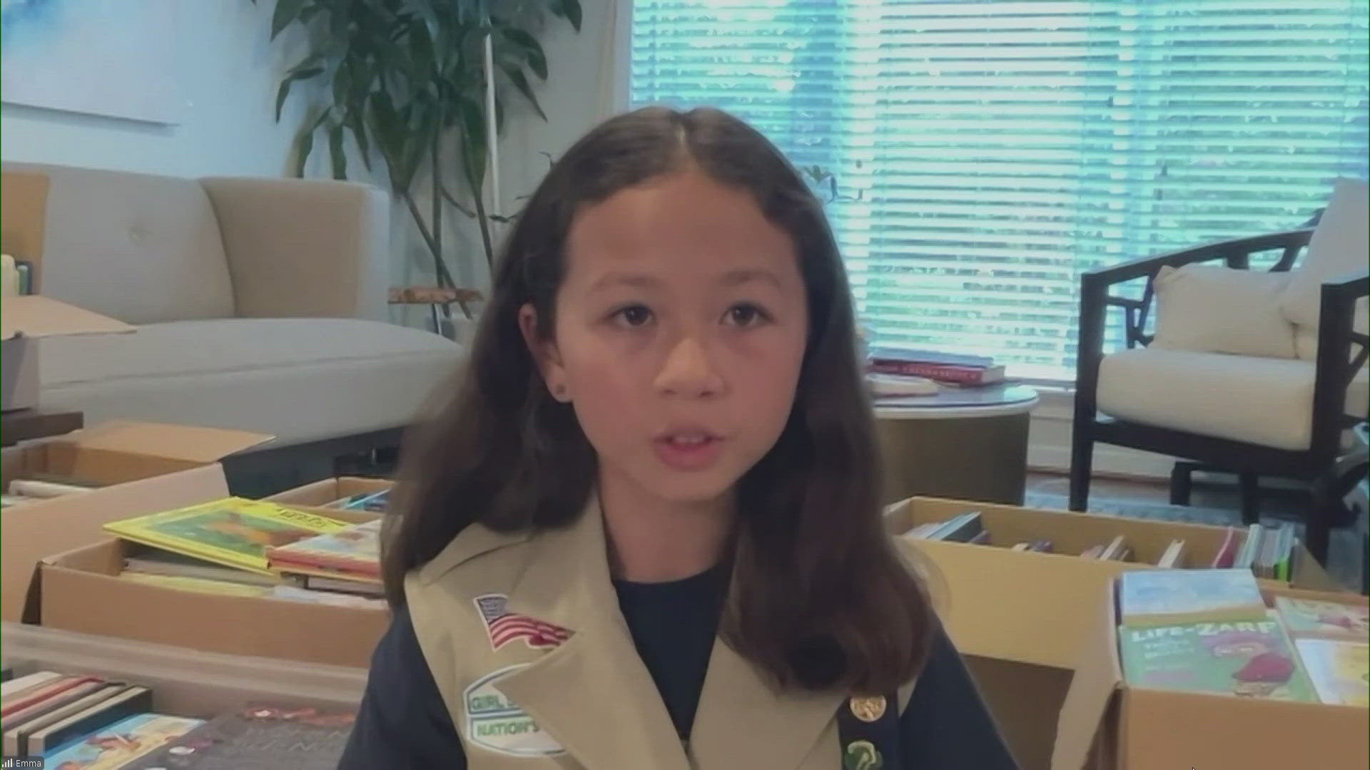 Girl scout cadet Emma, 11, says she is passionate about reading and making a difference. Emma's book drive will benefit the INOVA Cares Clinic in Falls Church.