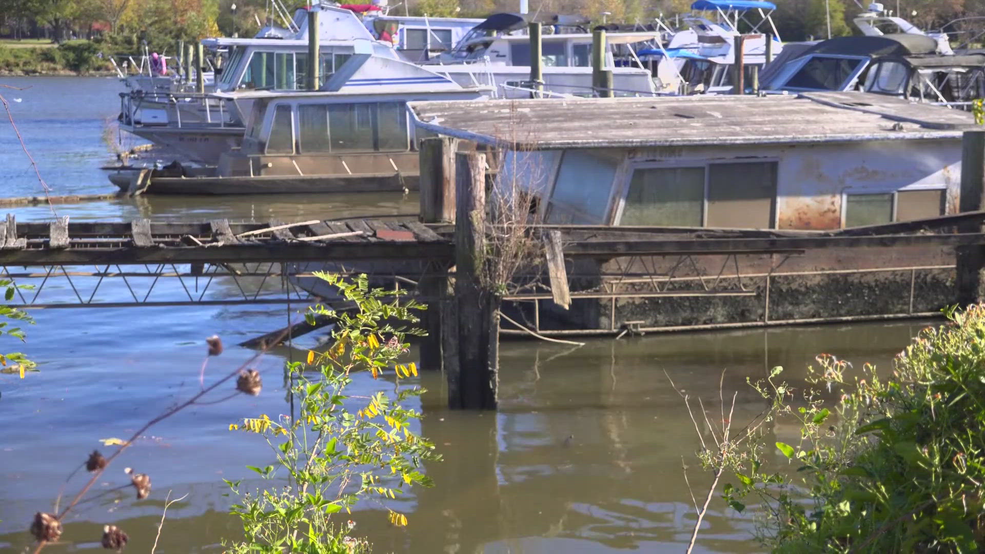 We're on the Anacostia River counting up the surprising number of abandoned and sunken boats that have been a blight on the waterfront for years.