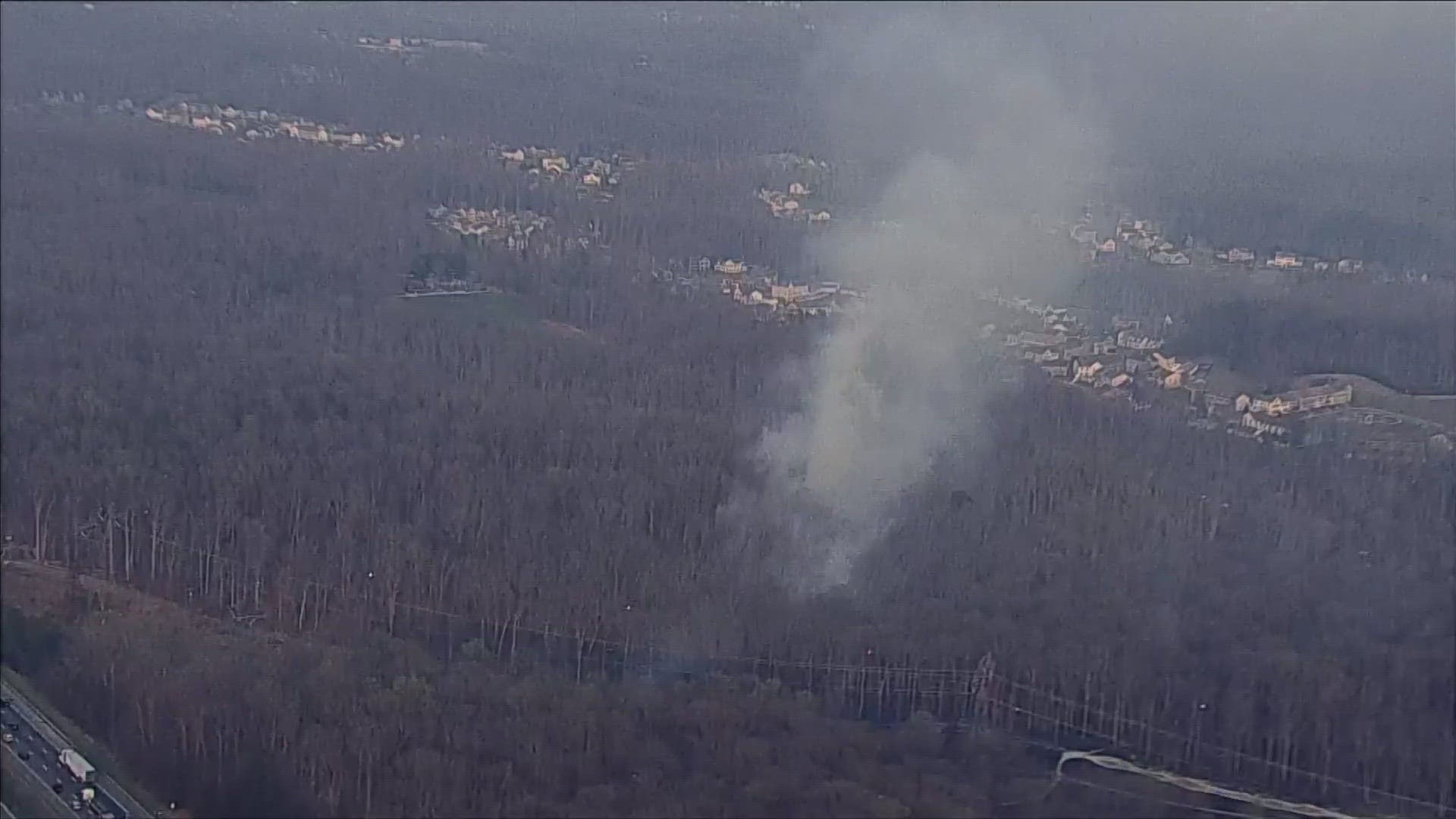 The brush fire may have been started by a downed power line and it appears to be quickly spreading.