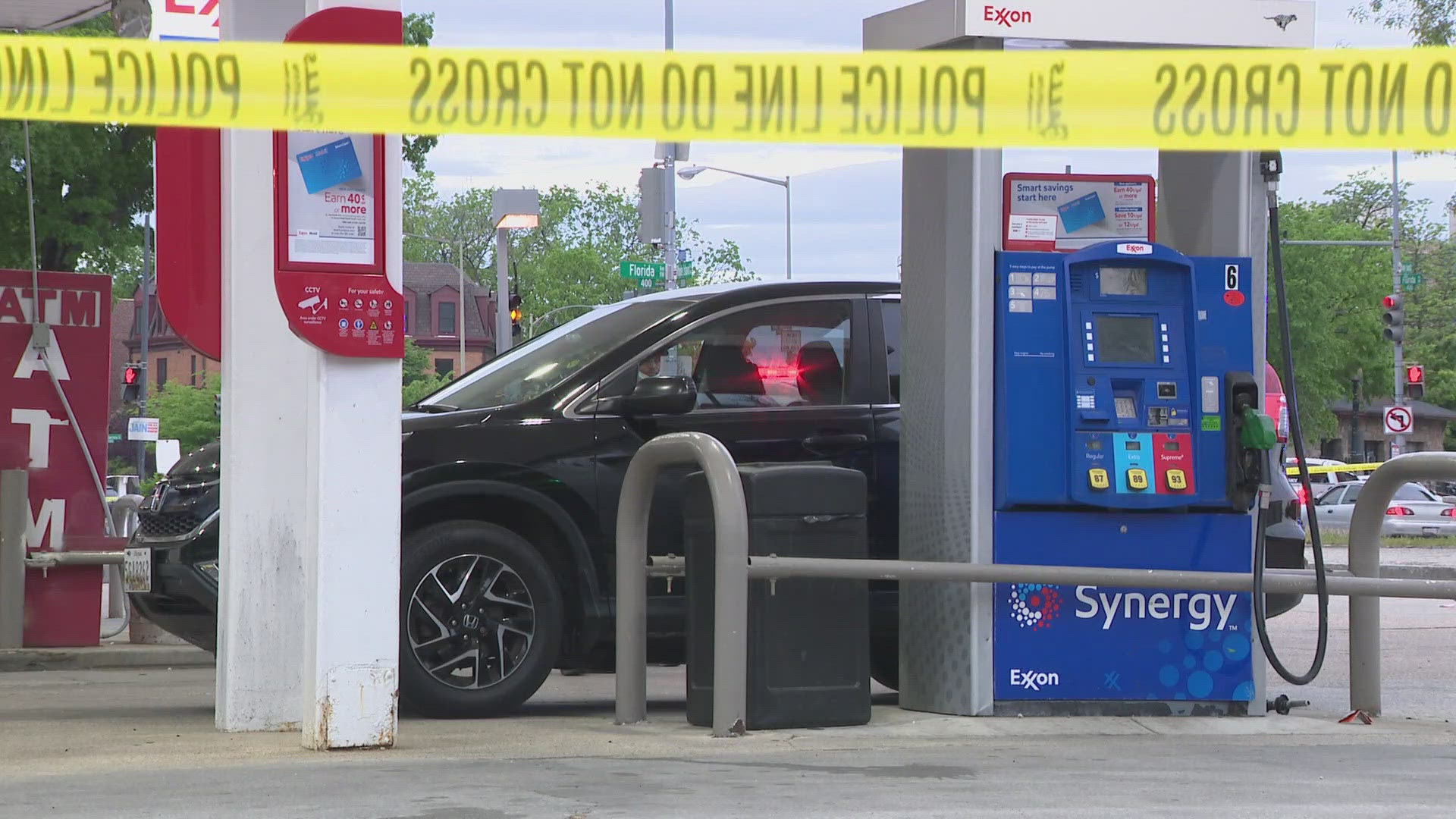 A man says he fought off a group of armed men at a gas station -- by spraying them with gasoline