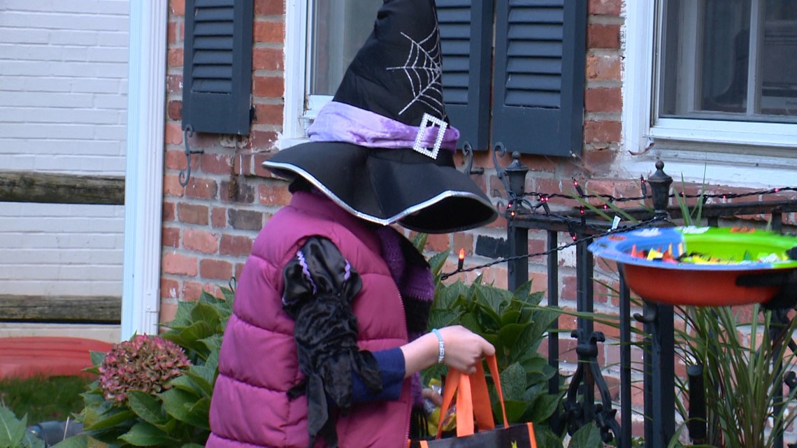 Neighbors hold Halloween early for a young girl battling cancer