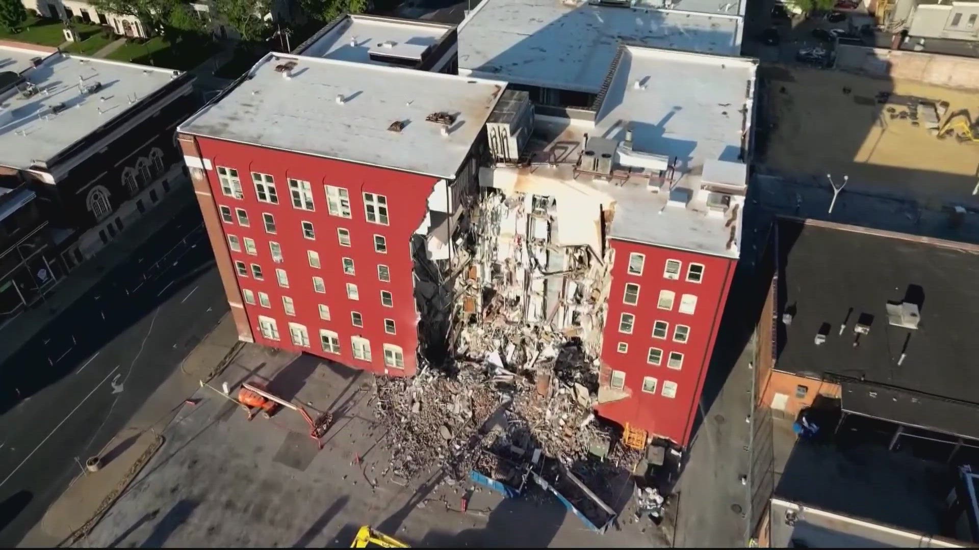 Five people were unaccounted for after an Iowa apartment building partially collapsed, officials said. Two of them are thought to be inside the building.