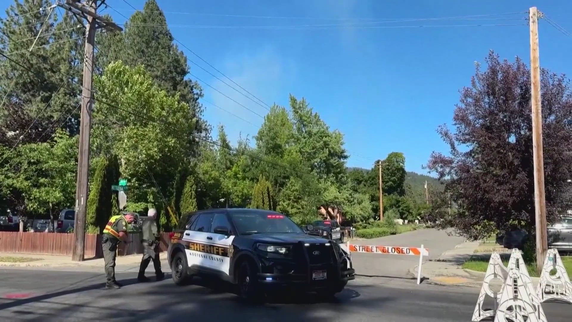 Police say the firefighters took sniper fire while responding