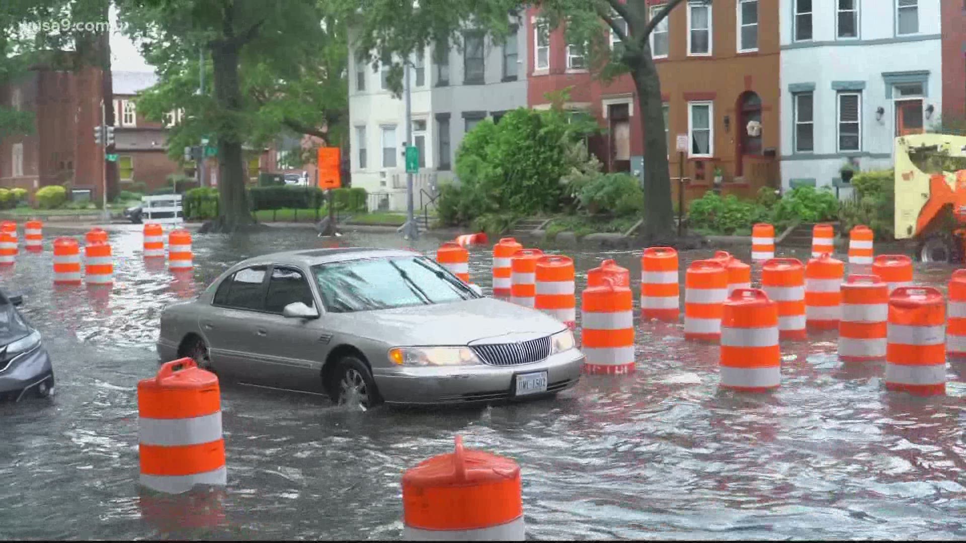 One car was seen reversing his car down Rhode Island Avenue after attempting to unsuccessfully trying to drive through 3-4 feet of flash flood waters.