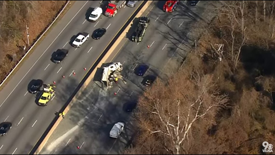 Overturned dump truck blocks lanes on Interstate 495 | wusa9.com