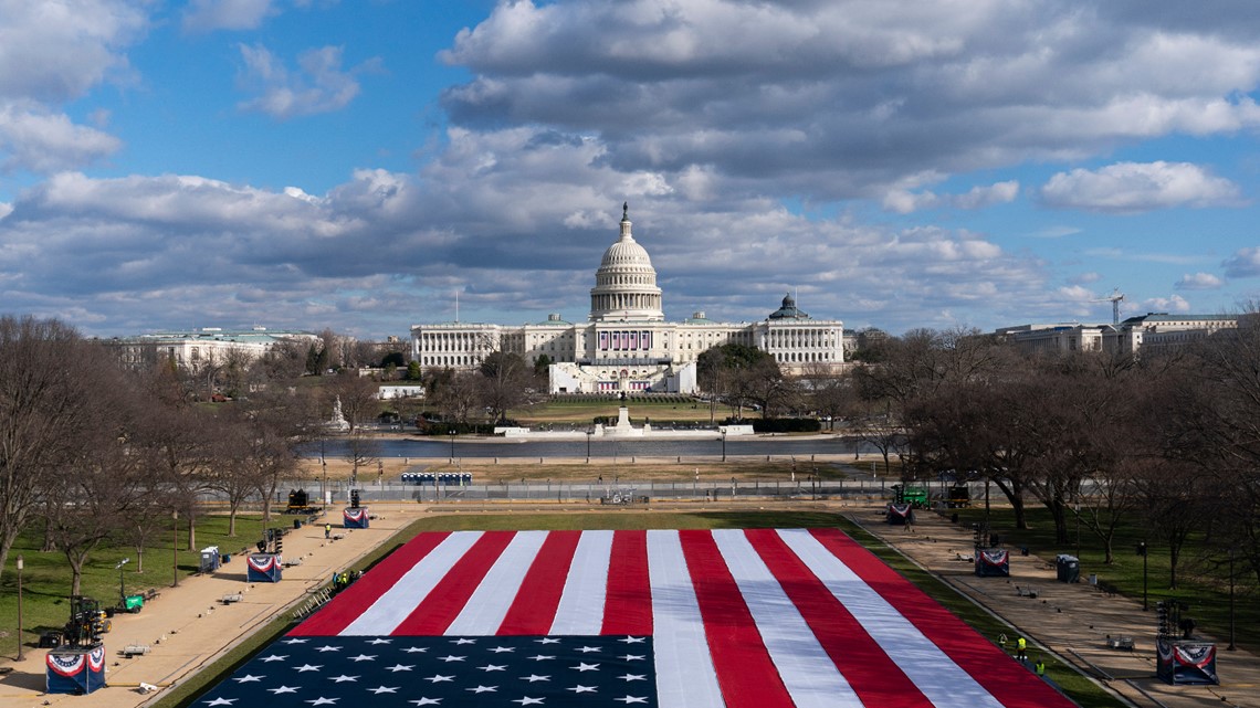 U.S. flags placed on the grounds of the National Mall ahead of Biden ...