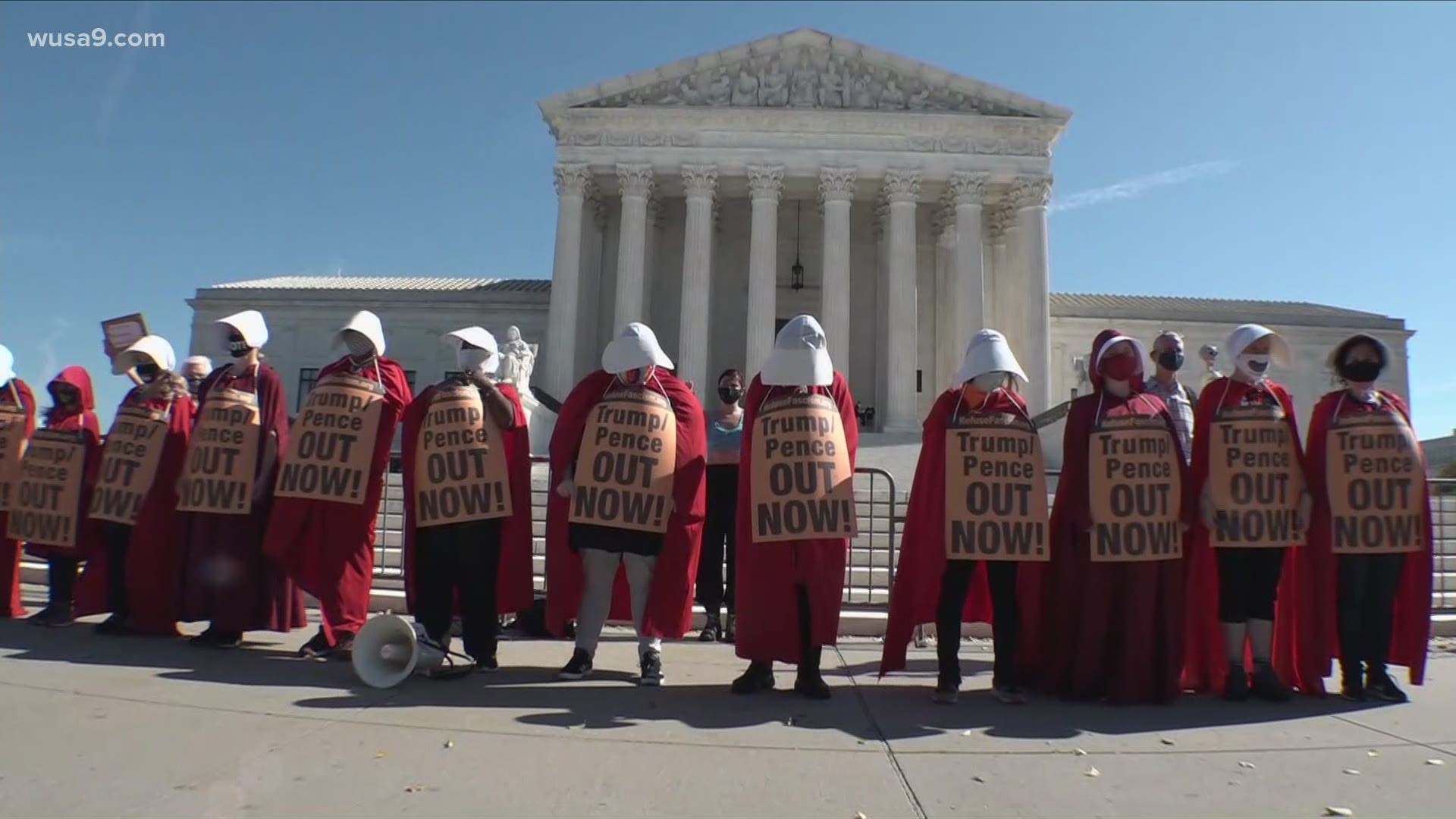 D.C. protesters dressed as 'handmaids' rally on the last day of Amy Coney Barrett's Supreme Court Justice nomination hearings.