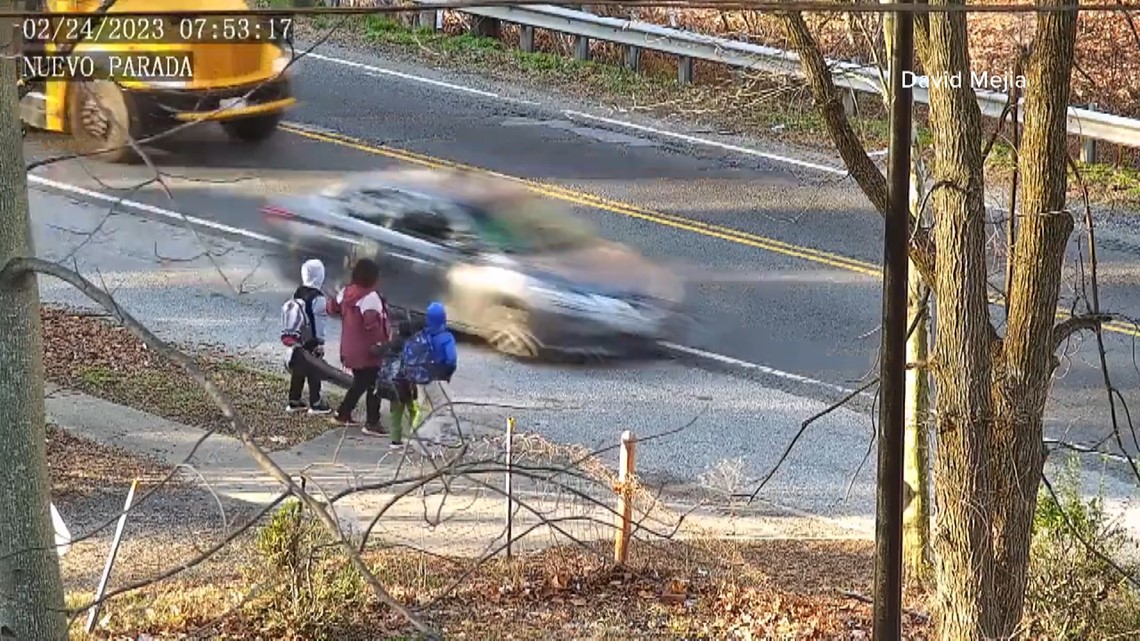 Drivers speeds by school bus, almost hits Maryland family - Vimarsana News