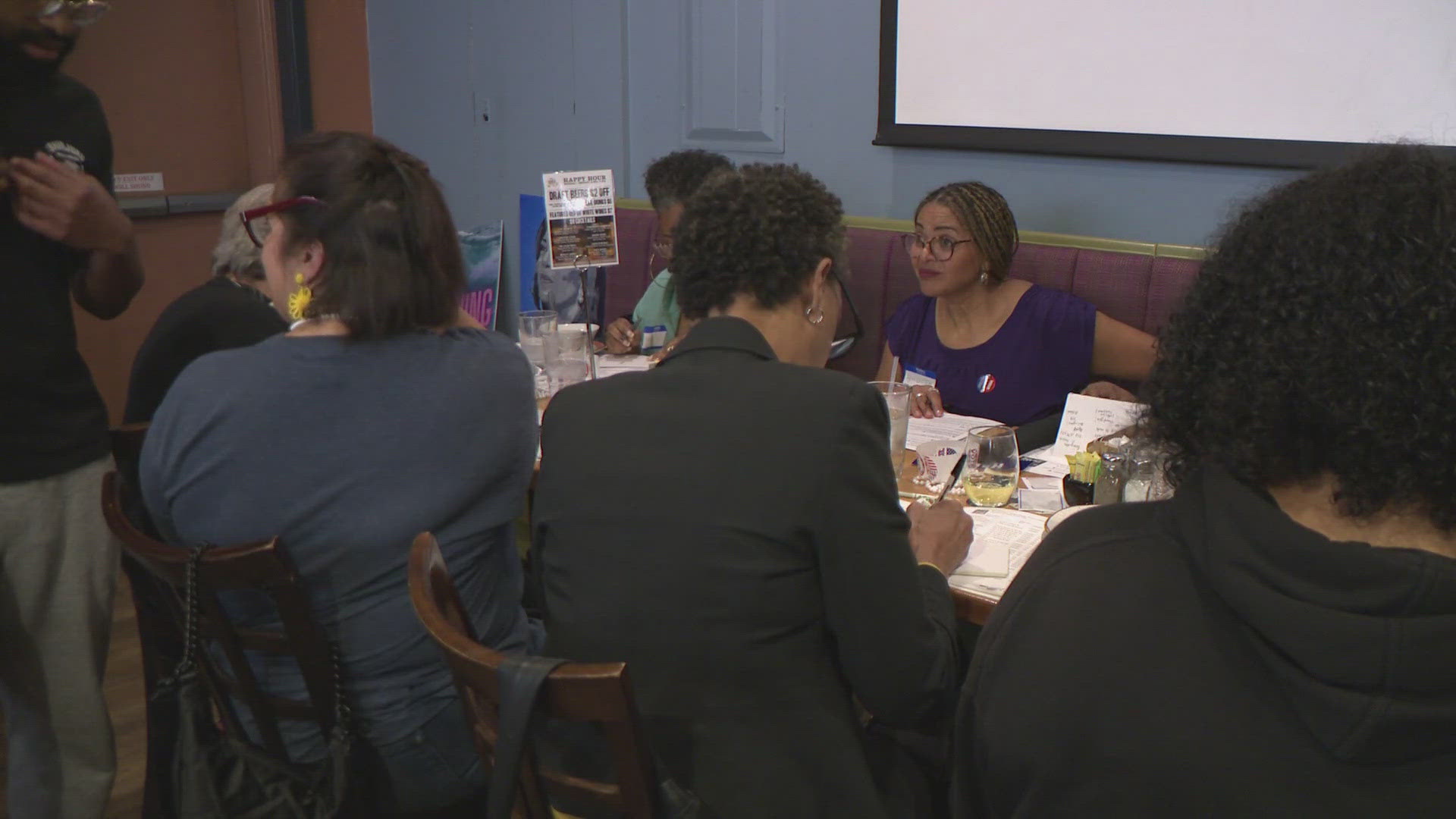 The Northern Virginia group of volunteers at Busboys and Poets where they hand-wrote messages that centered around one theme: Your voice counts.