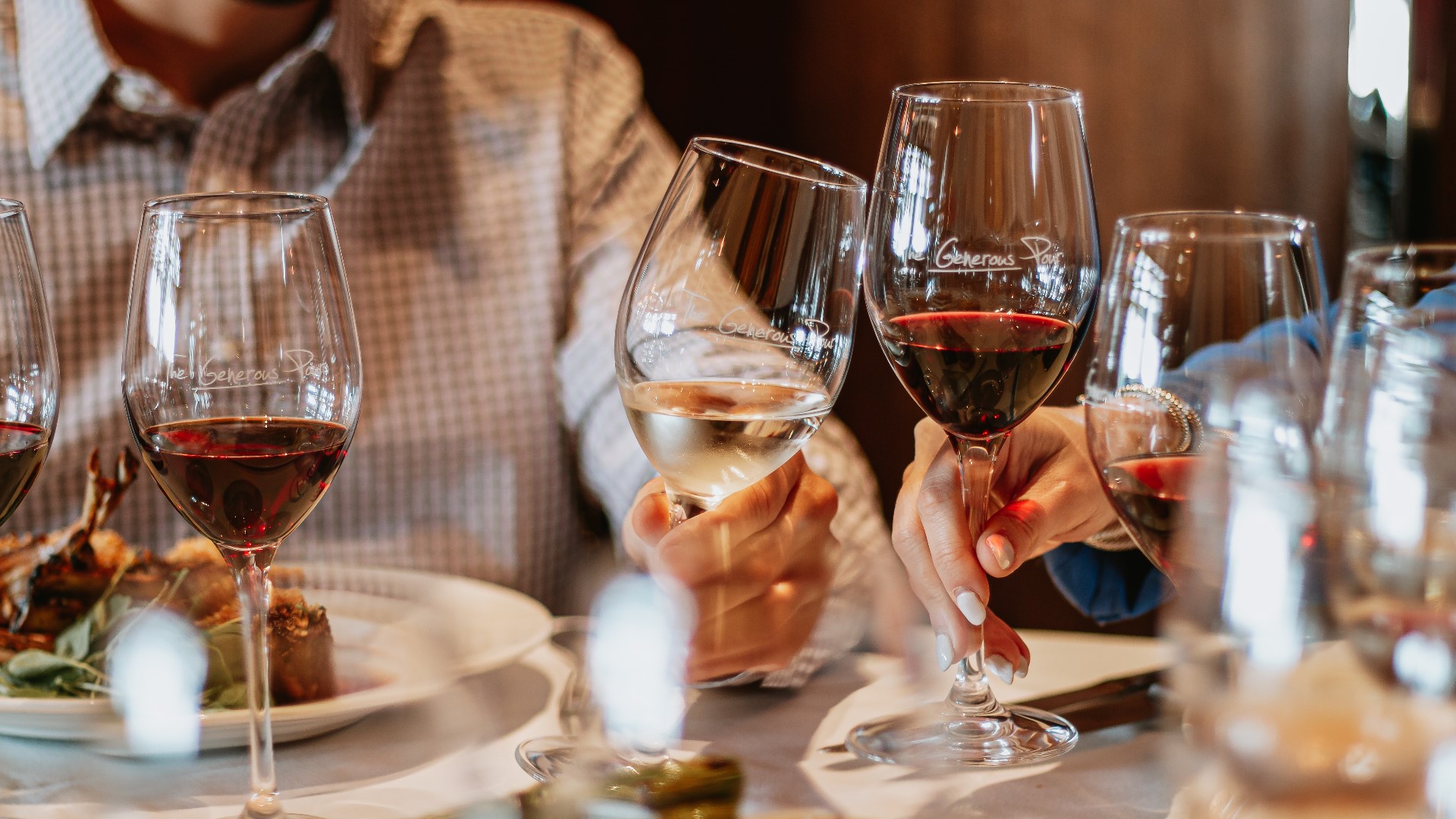 The Capital Grille's Managing Partner, Evan Blocker, showcases the seven world-class wines included in restaurant's summer wine series "The Generous Pour."