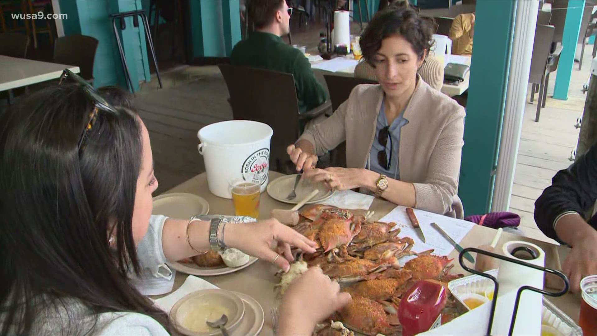 Crowds gather at Fisherman's Crab Deck ahead of Memorial Day weekend in Maryland's Eastern Shore.