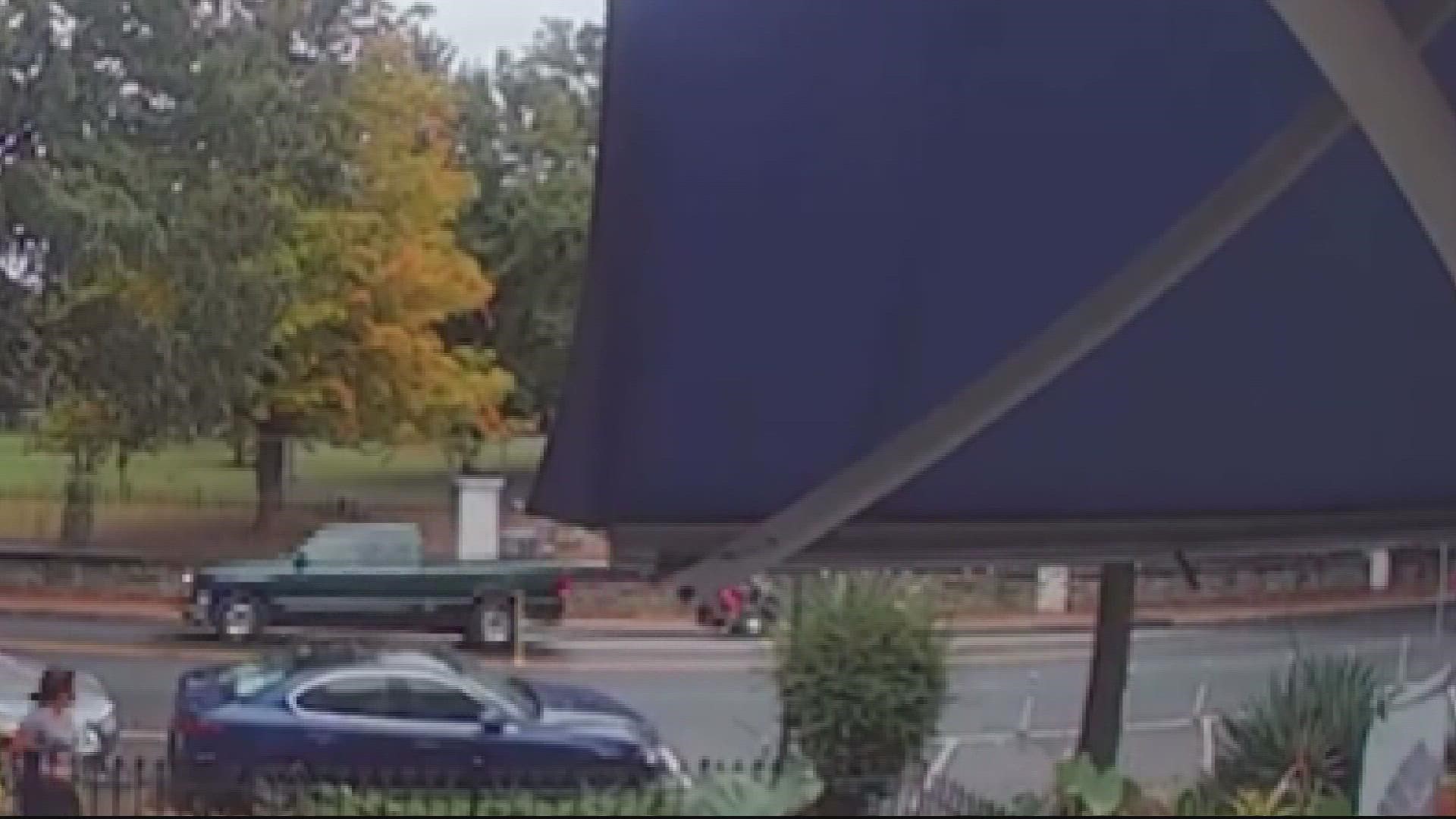 An exclusive look at the moment a truck hit a father and son riding on a moped - and drove off.