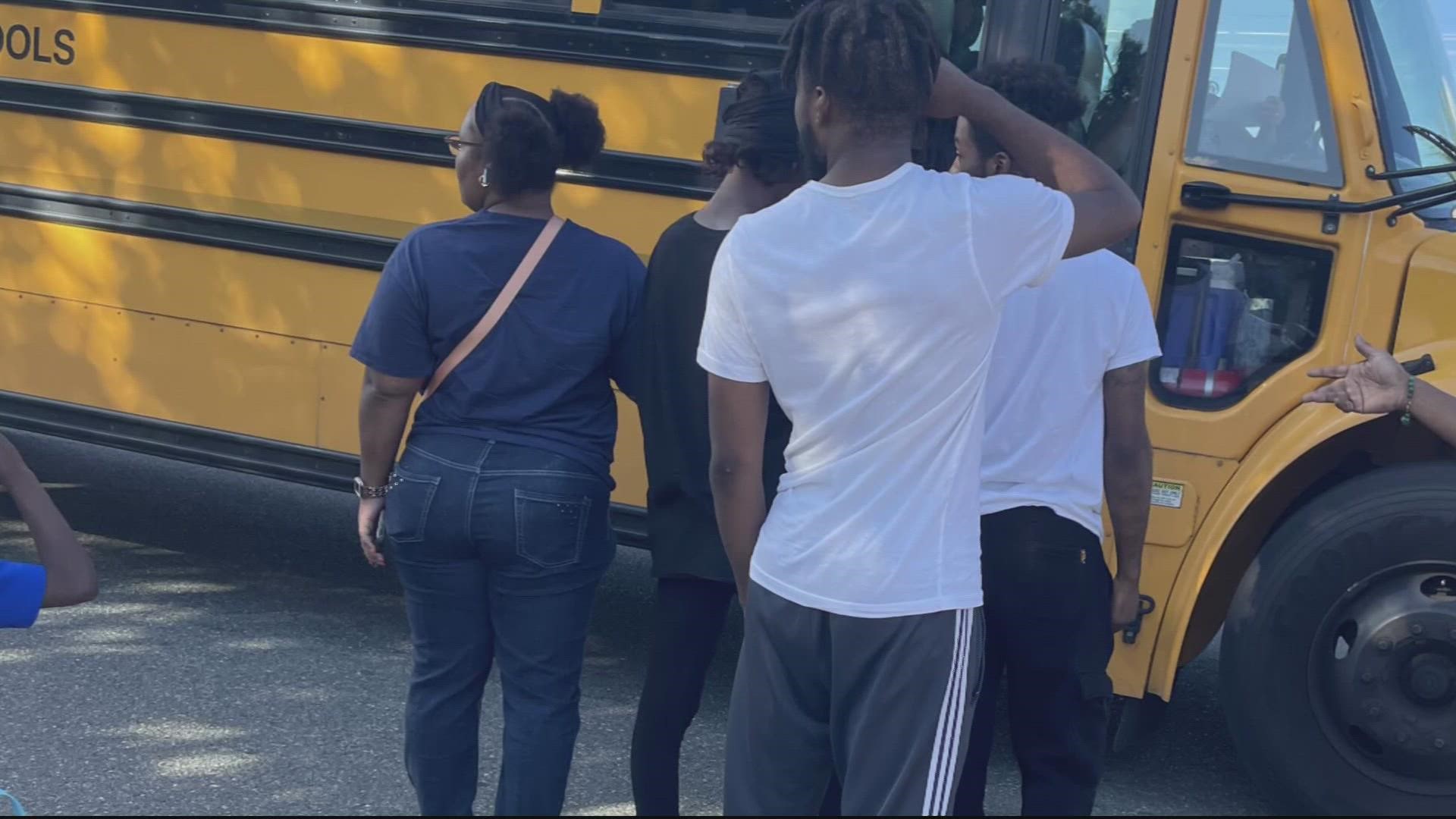 Parents in Dumfries are upset after police say a bus driver ran over a father who wanted to pick up his child. The dad, who was injured, is now facing charges