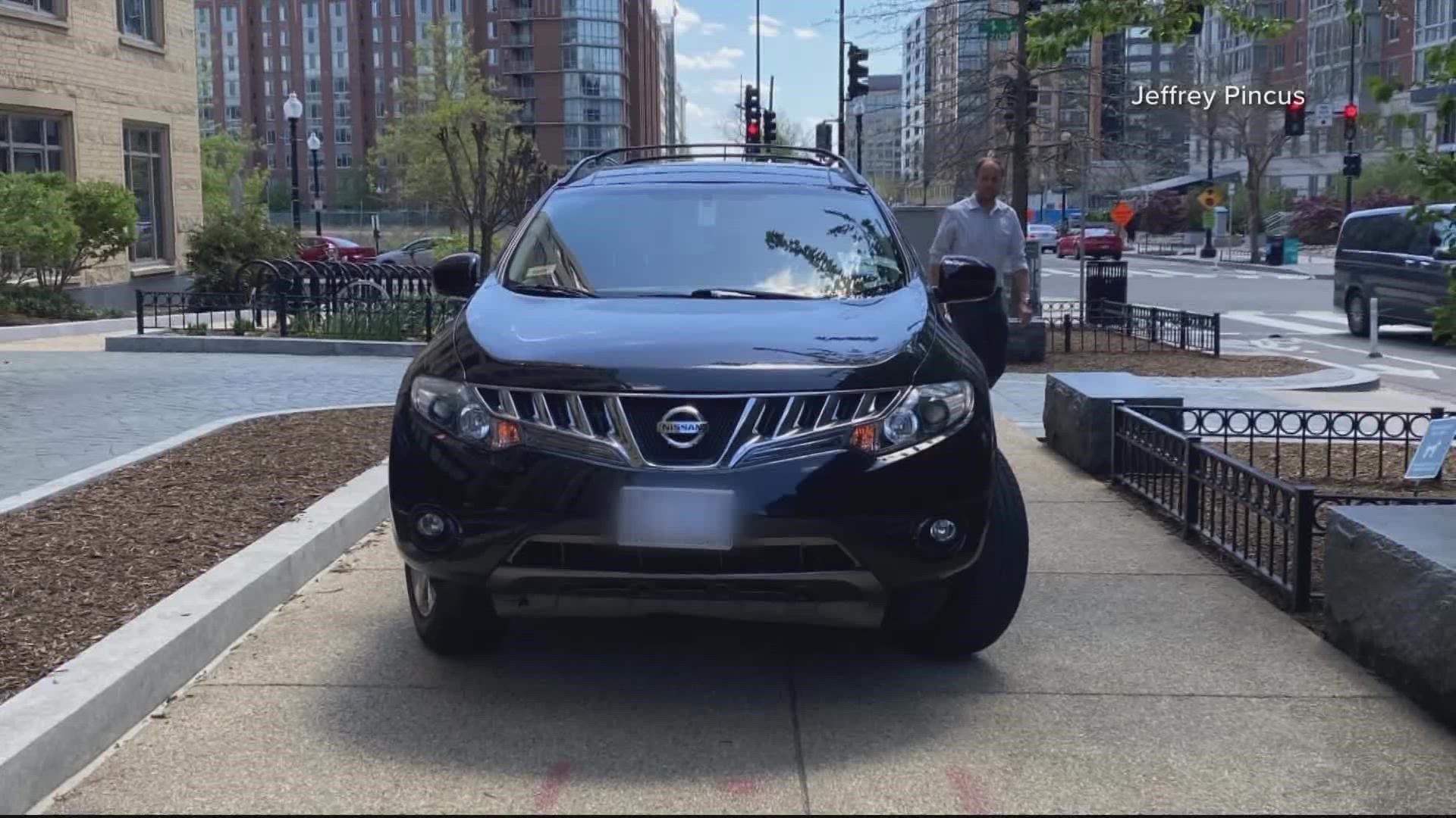 A Navy Yard resident spotted this car, which has 50 separate tickets, parked on the DC sidewalk Sunday.