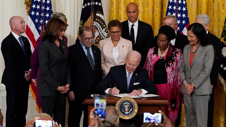 Biden signs police reform executive order surrounded by families of people killed by cops