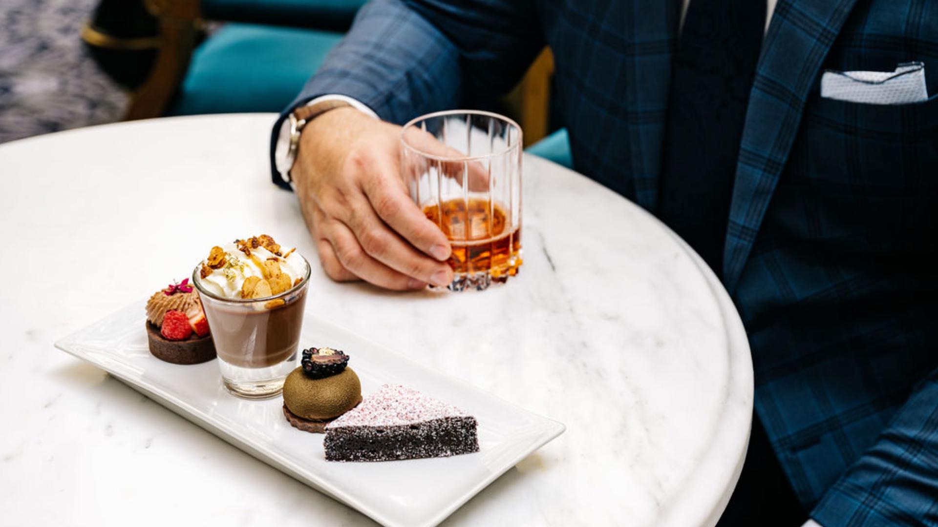Valentin Mihail and Kristin Brangwynne preview a tasting of their Bourbon & Chocolate pairings which is part of Wednesdays at Waldorf Astoria.