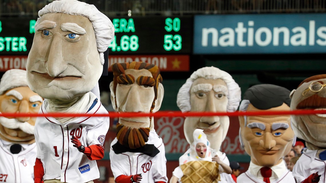 WASHINGTON, DC - APRIL 29: The Nationals bald eagle Mascot Screech dances  in his Cherry Blossom City Connect jersey and fedora hat during the  Pittsburgh Pirates versus Washington Nationals MLB game 2