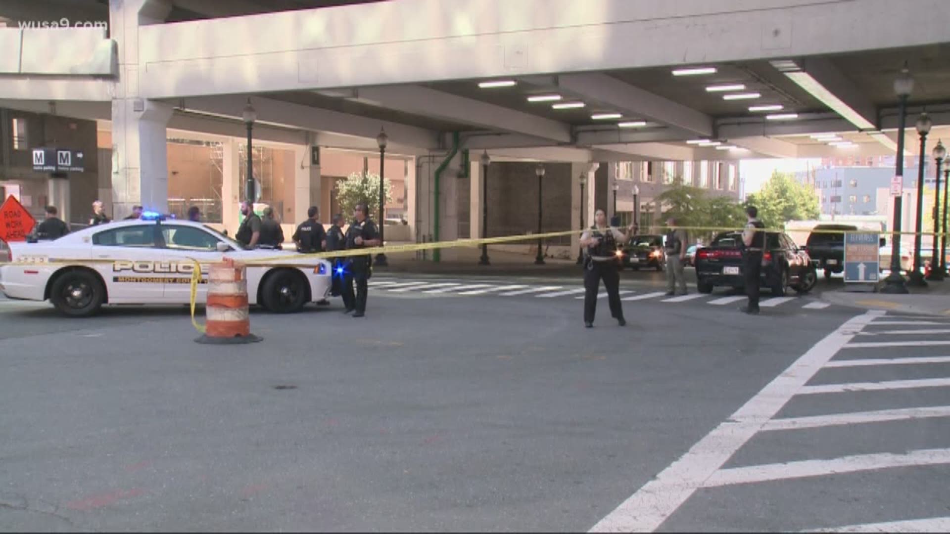 A 13-year veteran of the Montgomery County Police Department died after he was shot on the top of a parking garage in downtown Silver Spring Monday morning.