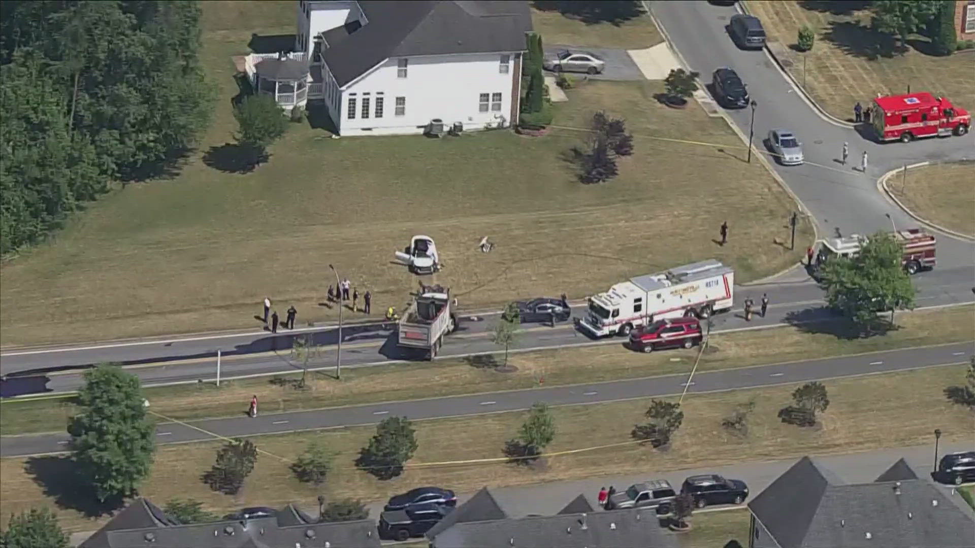 One person was killed and a child has been rushed to the hospital after a crash involving a car and a dump truck in Beltsville on Friday afternoon.