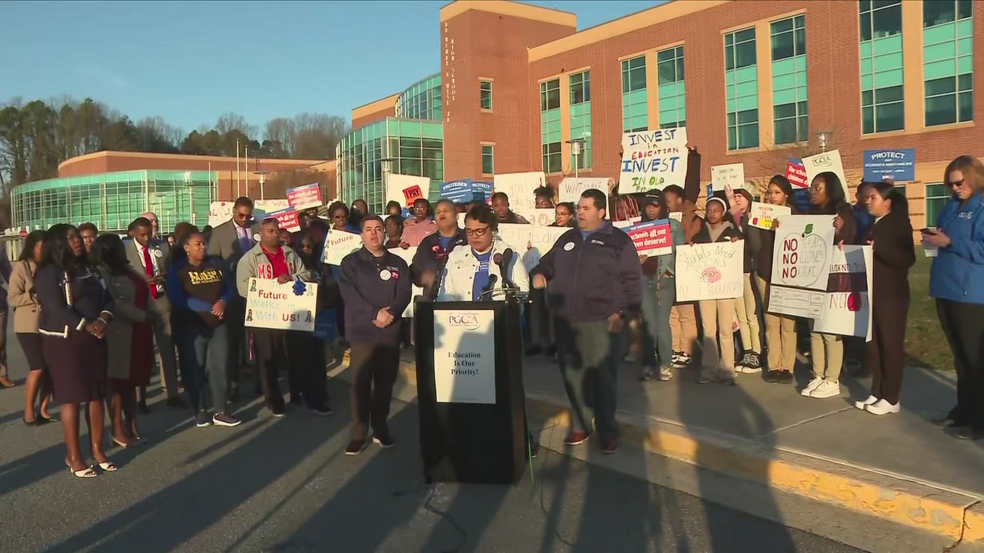 Teachers, staff, and students protest cuts to the Education Department ...