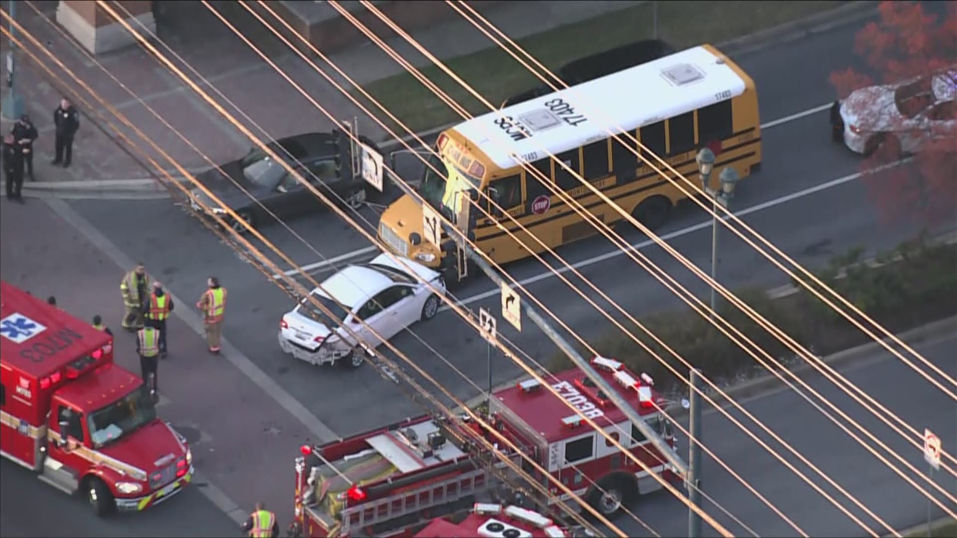 School bus collides into several cars in Rockville, Md.