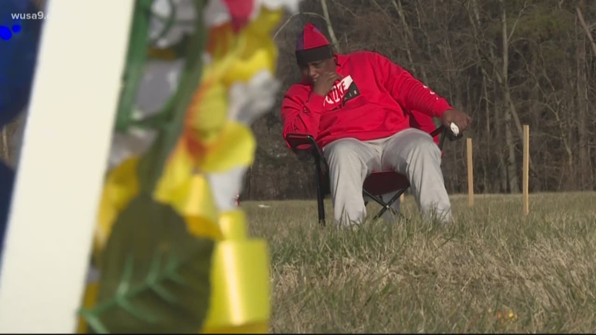 Earl Davis visits the grave site of his son Brian at the National Harmony Cemetery in Landover.