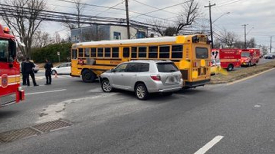 SUV collides with school bus carrying middle school students | wusa9.com