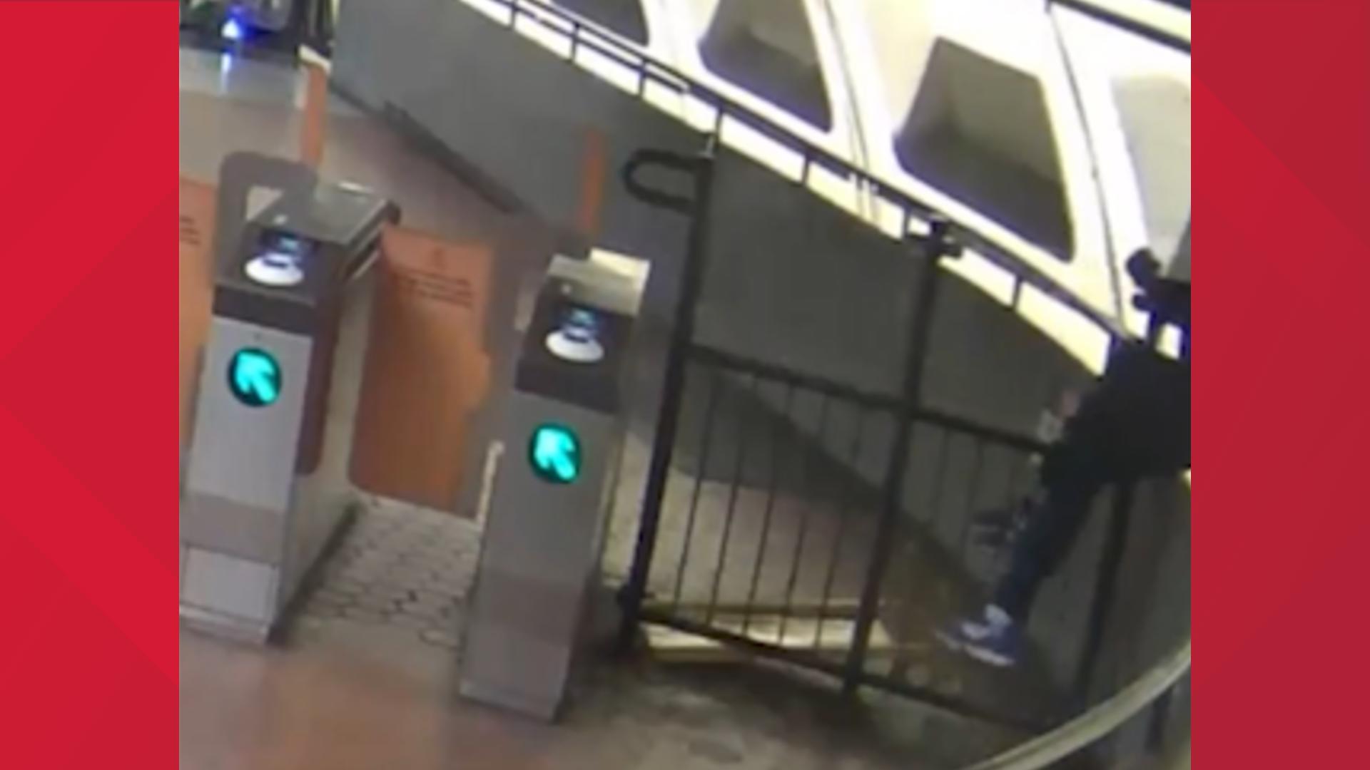 In video shared by WMATA, a person can be seen falls while trying to climb over a fare gate.