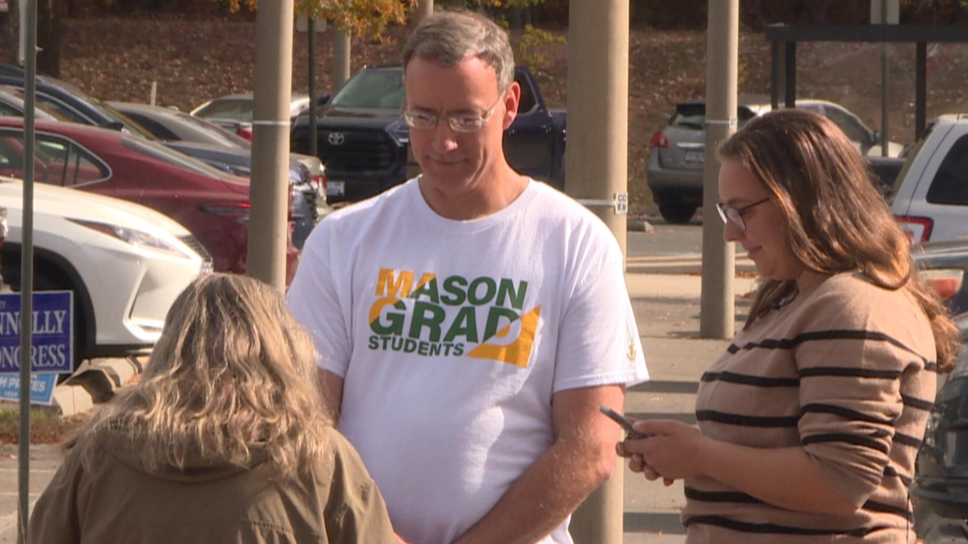 GMU students conduct exit polls to measure polarization.