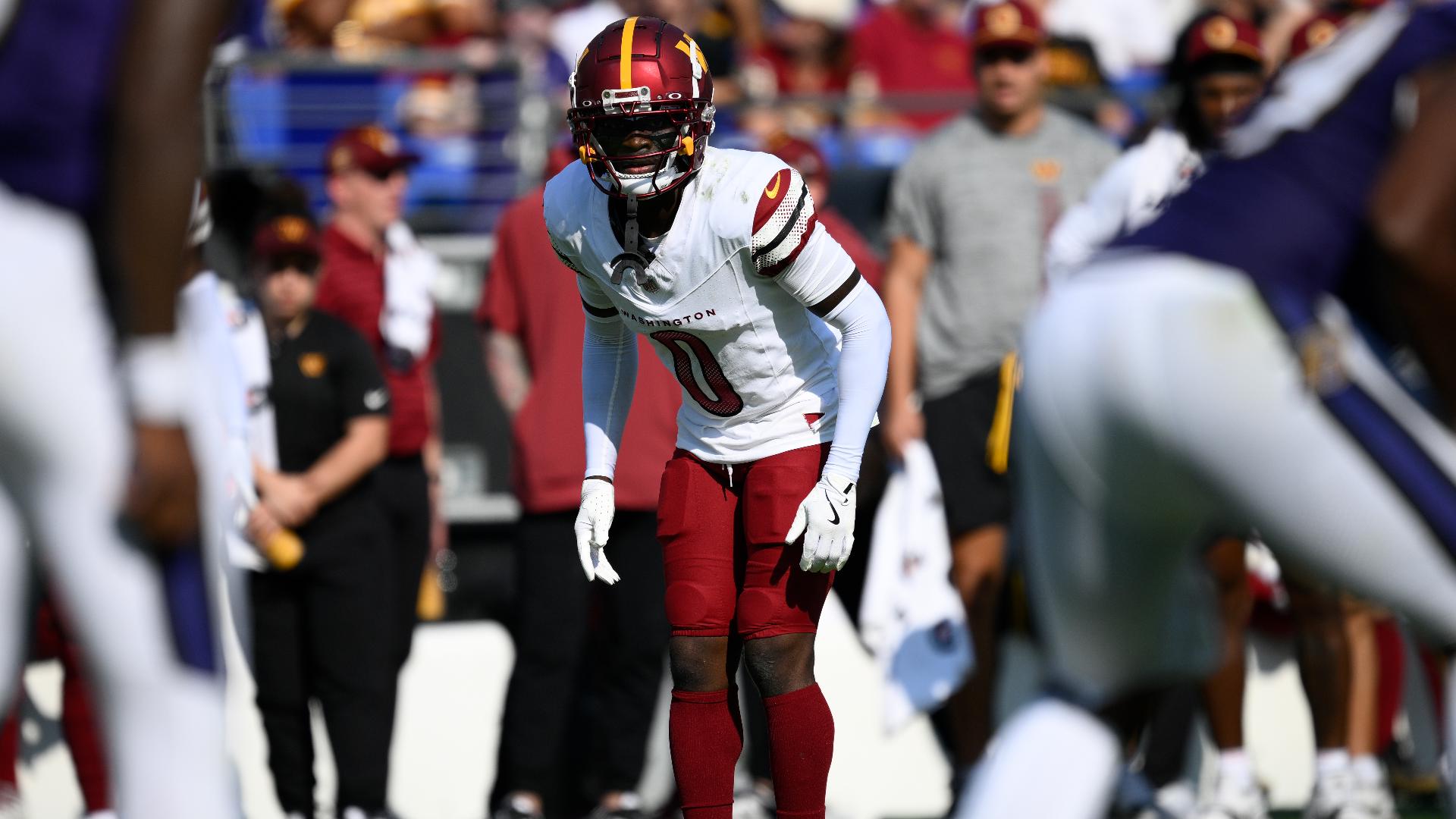 Rookie cornerback Mike Sainristil got his first NFL interception on Sunday, and it was thanks in part to the early advice he got from a Washington legend.