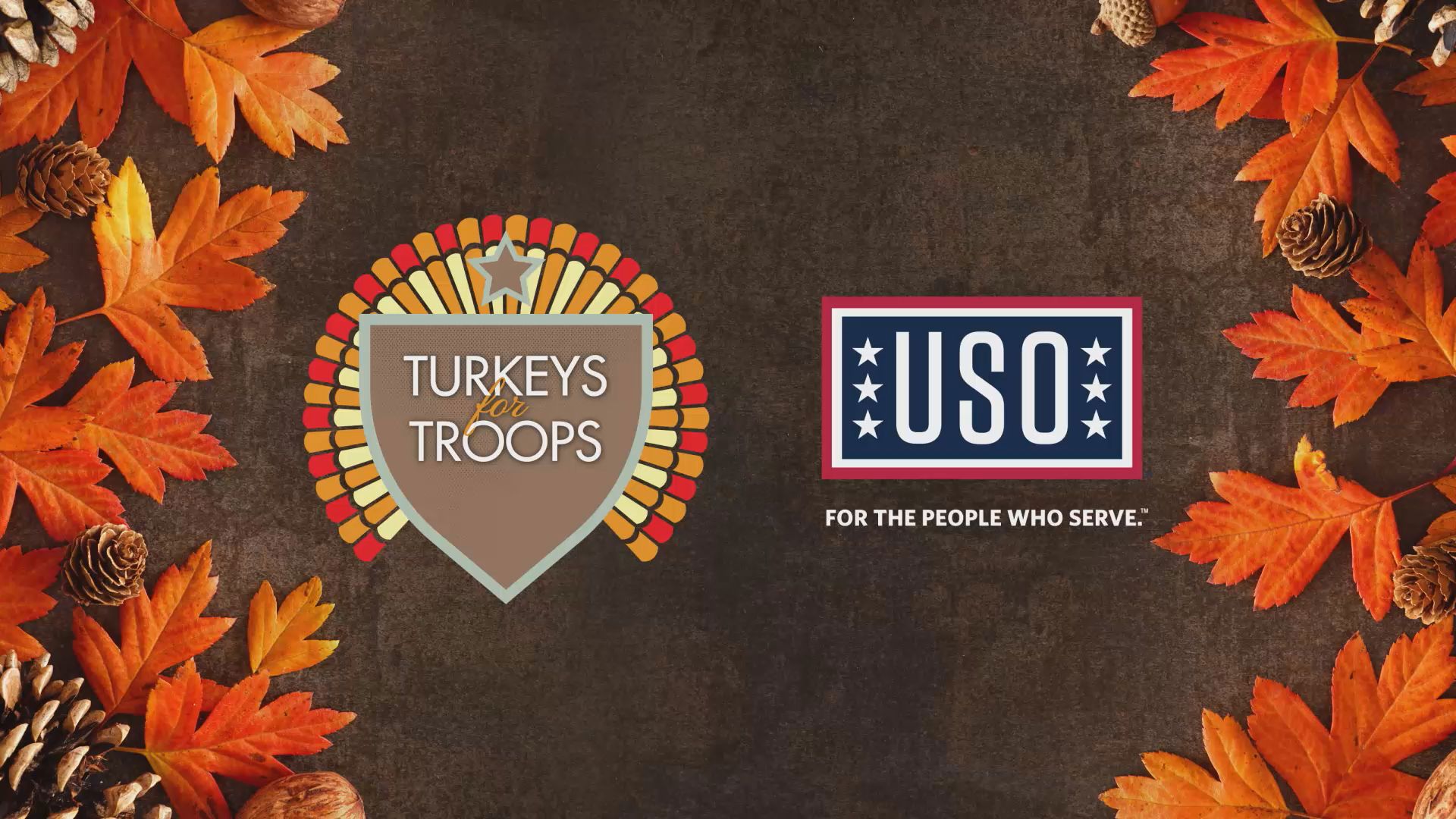 John Falin, the Executive Director of the Mid-Atlantic USO, accepts a $10,000 donation from WUSA9 to the USO for the 'Turkeys for Troops' program.