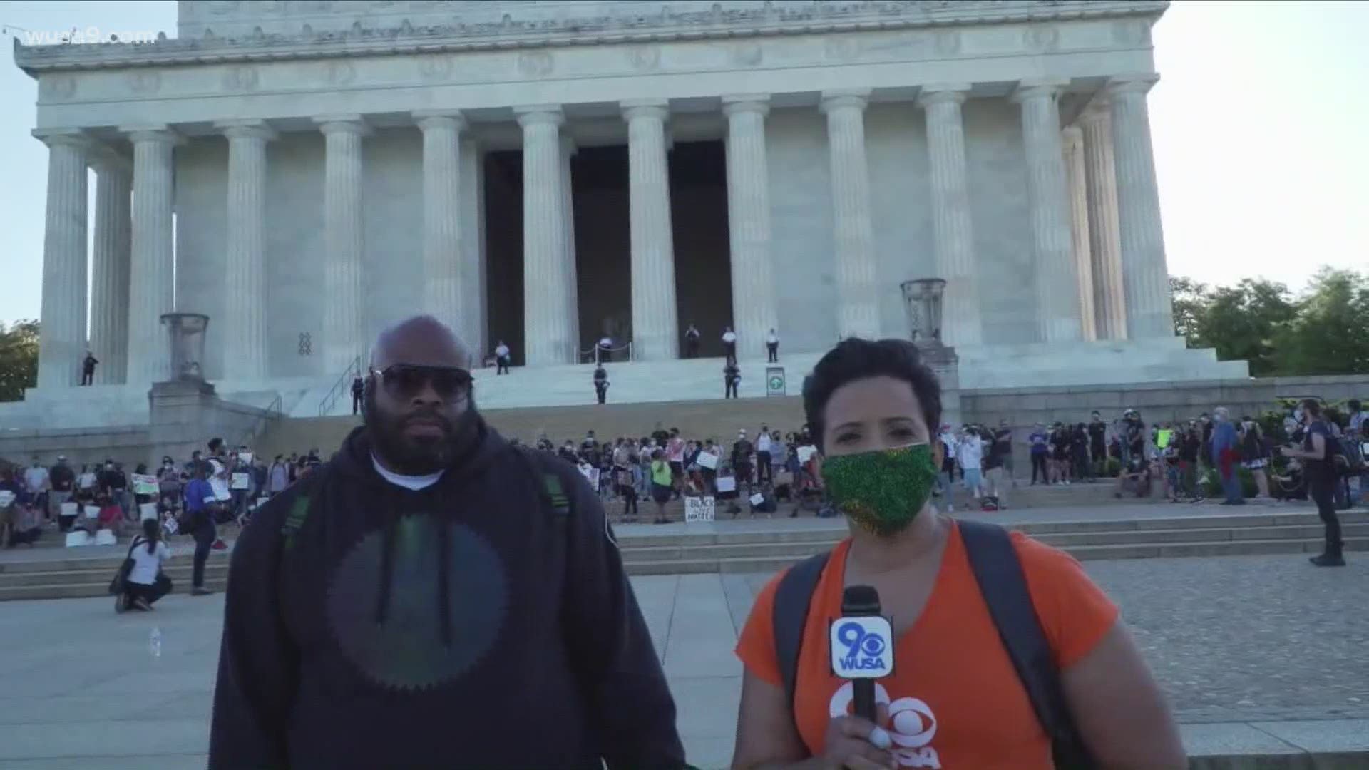 Nearly 200 demonstrators marched up the steps of the Lincoln Memorial chanting the name of George Floyd.