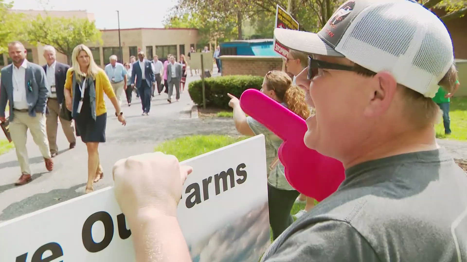 A Data Center Summit at Frederick Community College Thursday turned into what some protestors called a "walk of shame."