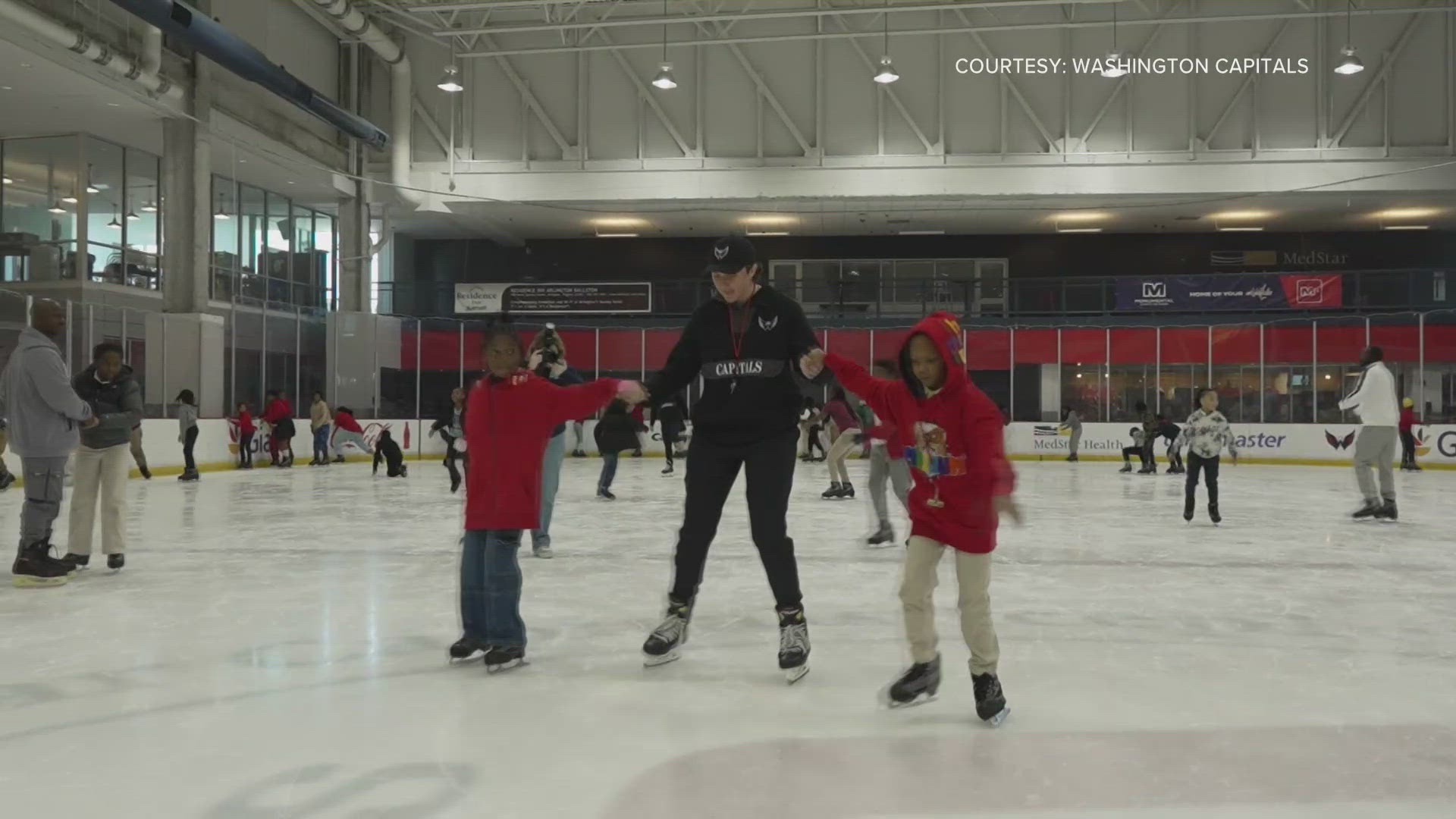 D.C.'s ice hockey team hosted hundreds of D.C. Public School students on the ice at the Washington Capitals practice facility in Arlington.