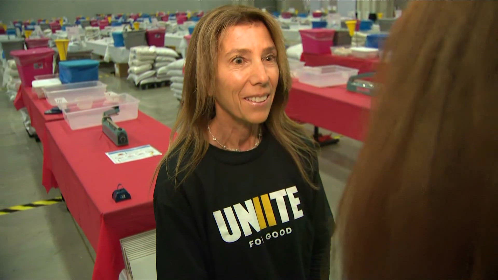 Volunteers pack meals for 9/11 Day of service