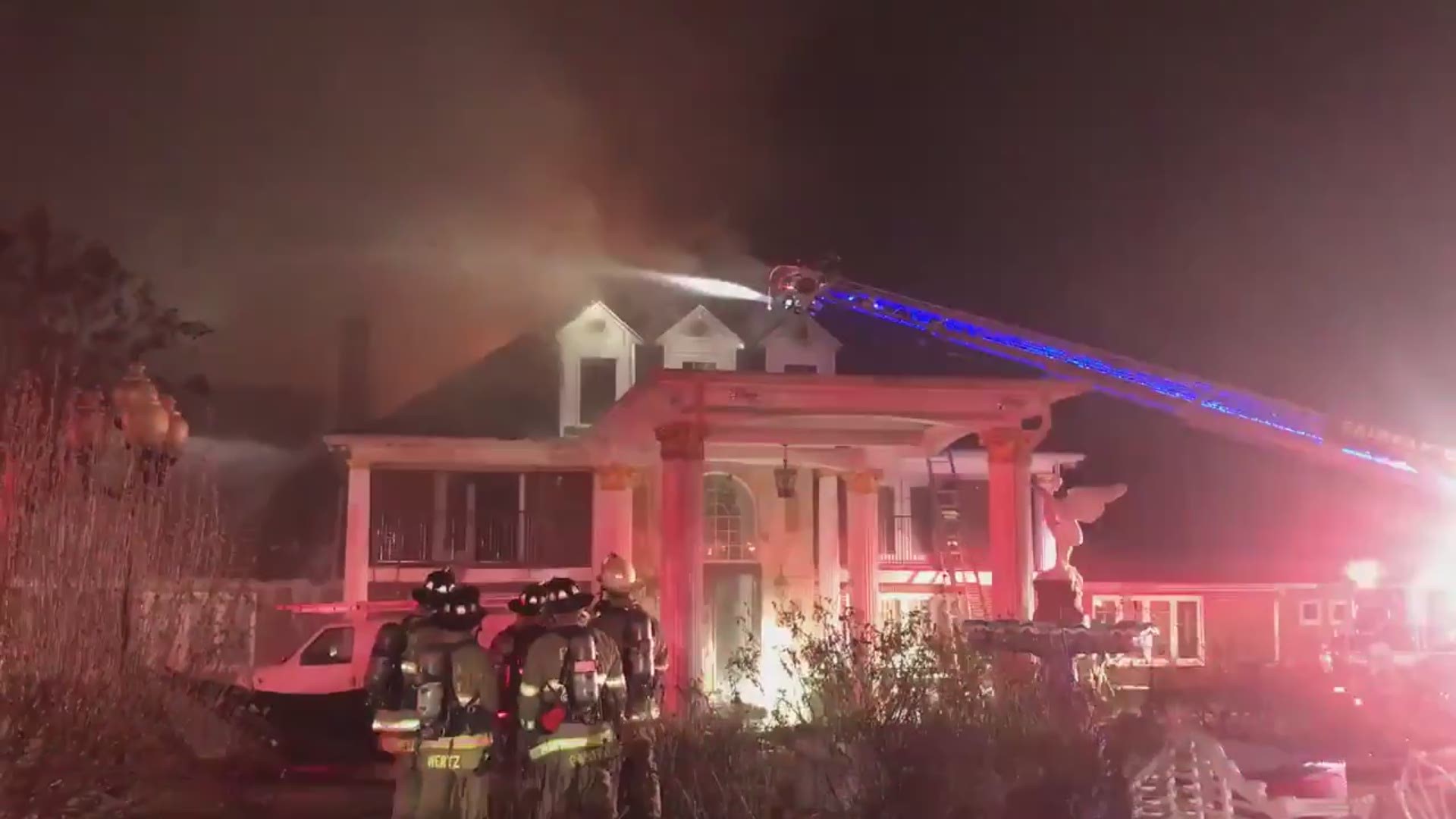 A large number of fire crews responded to a blaze in McLean, Virginia, that at one point had flames coming through the roof.