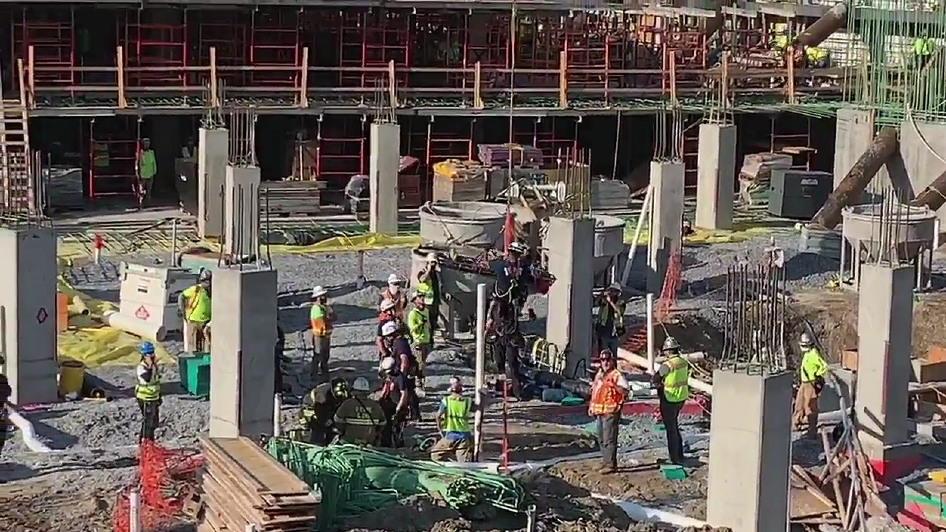 Two construction workers were struck by falling materials at a site on Maine Avenue in DC.