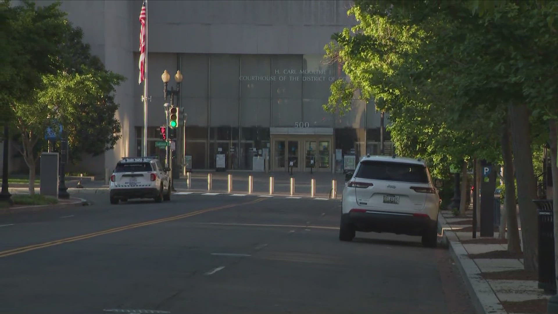 Police are investigating after a red backpack was found tied around a flag pole outside the court house.