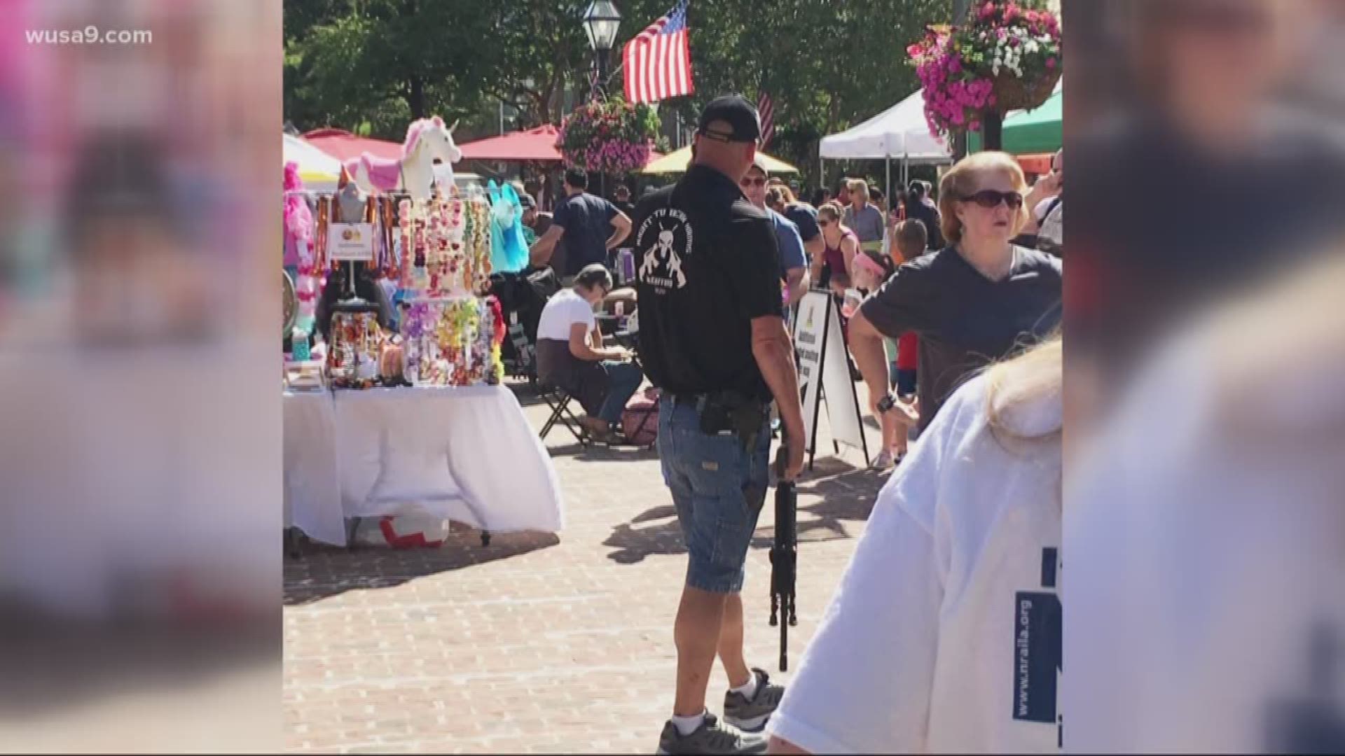 Some people are calling this a shocking sight, pictures like this show a man carrying an assault rifle through the Alexandria farmers market.