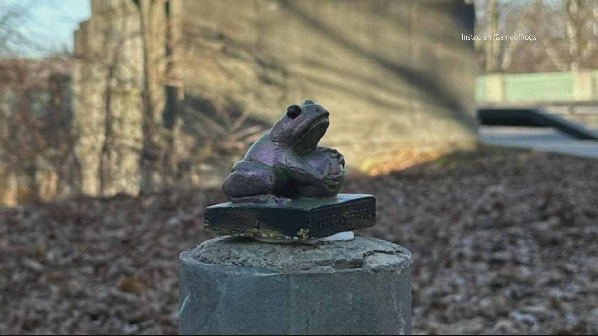 A frog holding a globe, maybe in different colors. So what's this all about?